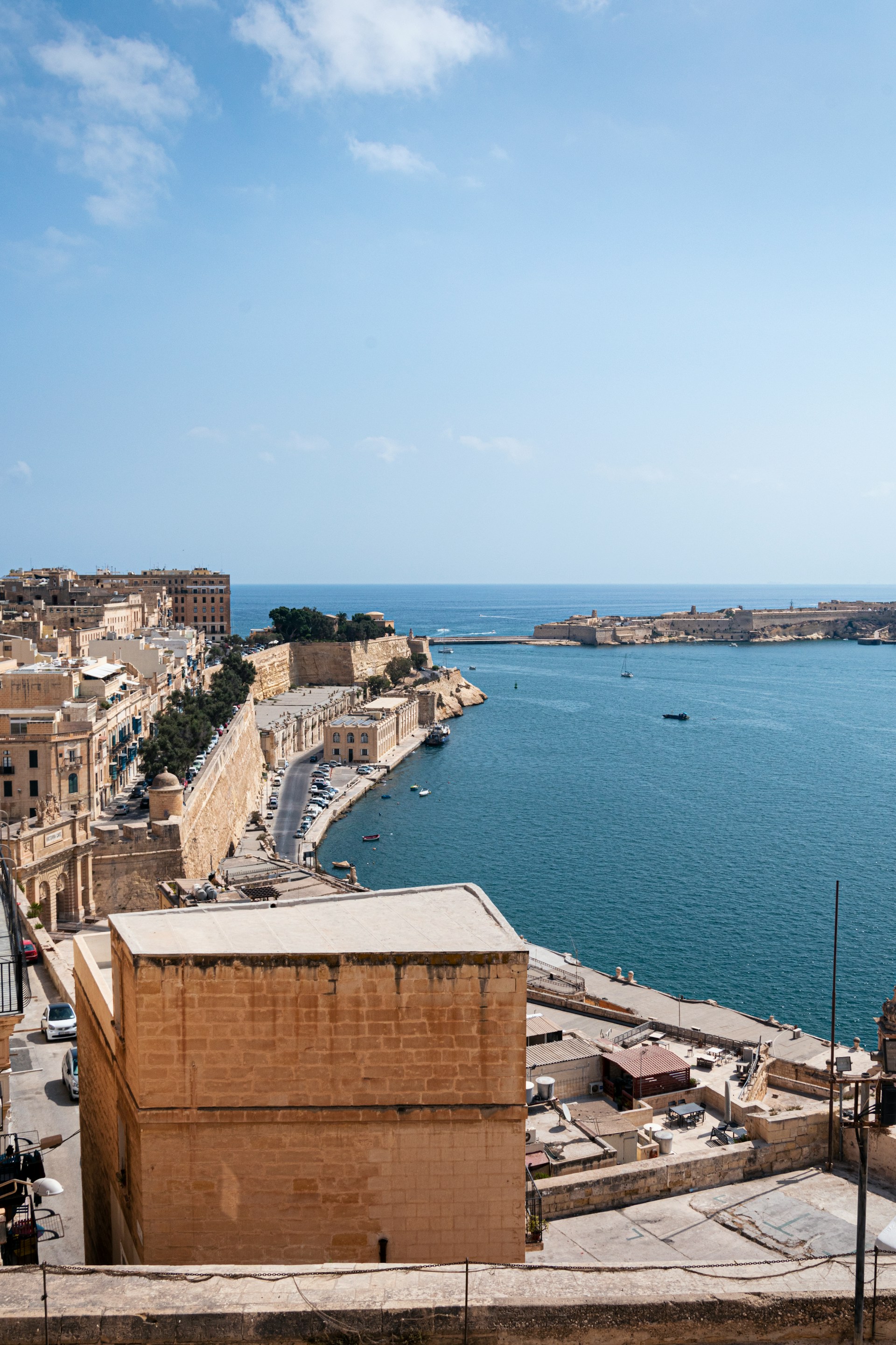 a-large-body-of-water-next-to-a-city