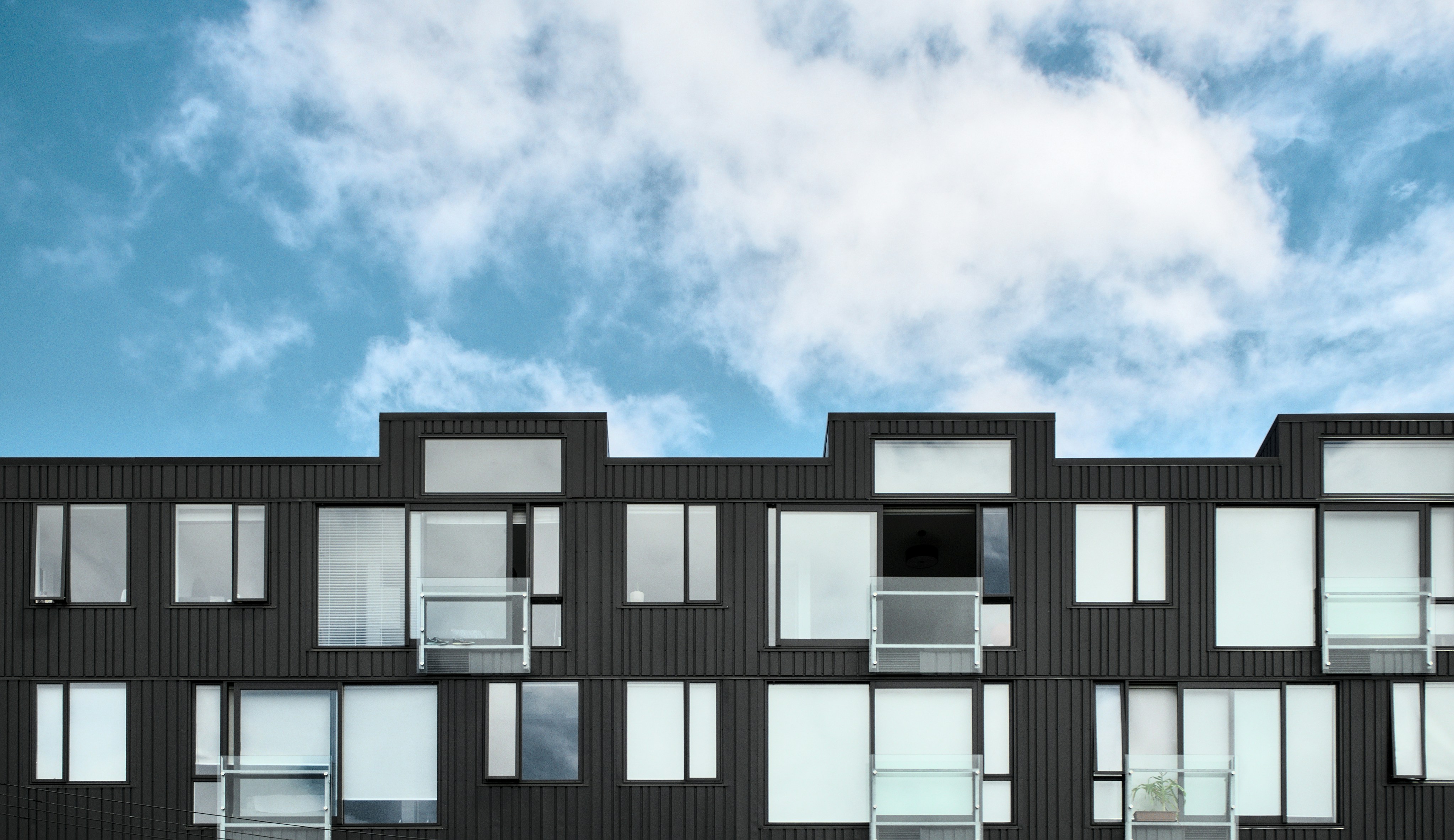The picture shows an apartment block