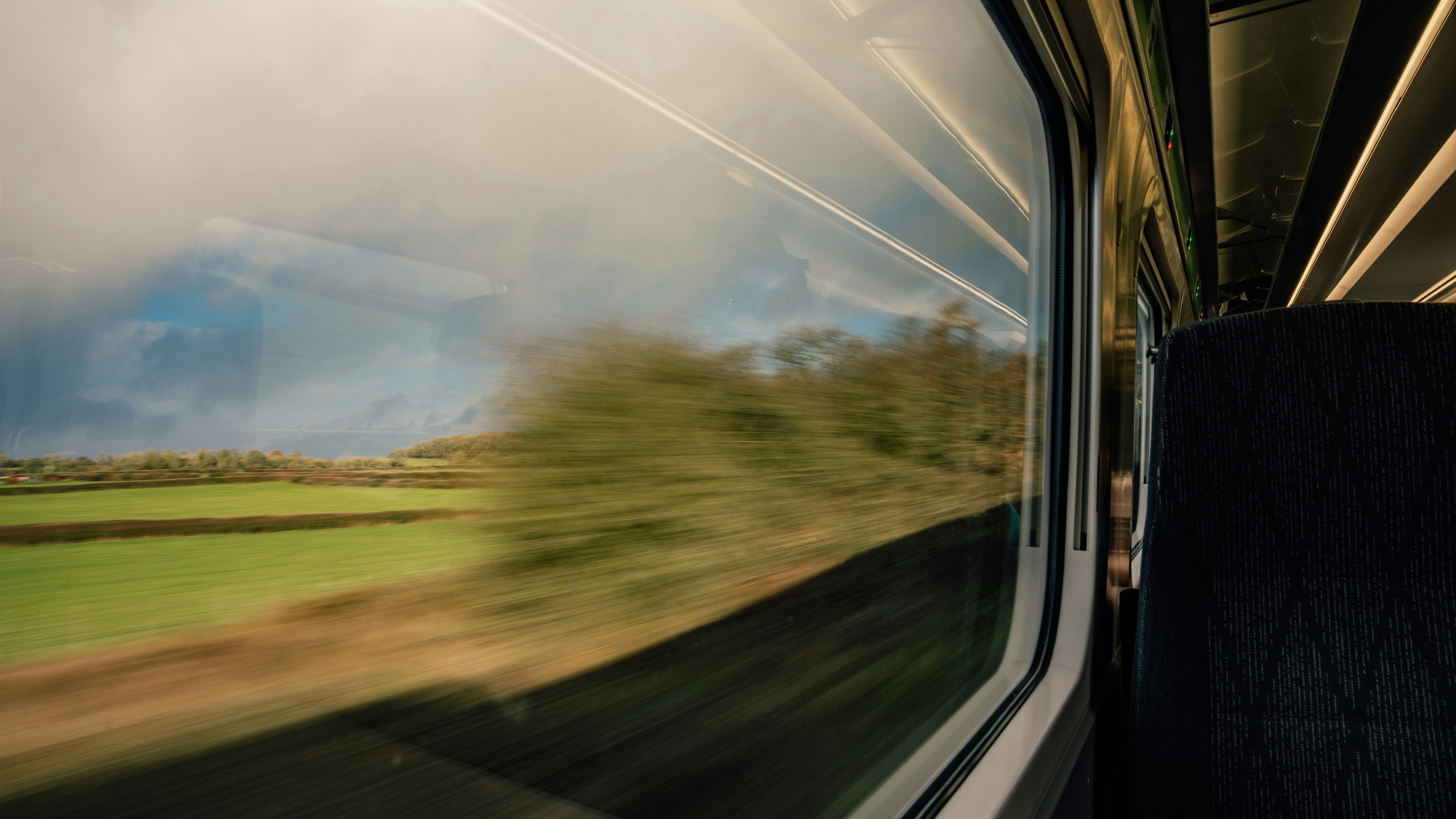 a-blurry-photo-of-a-train-going-by
