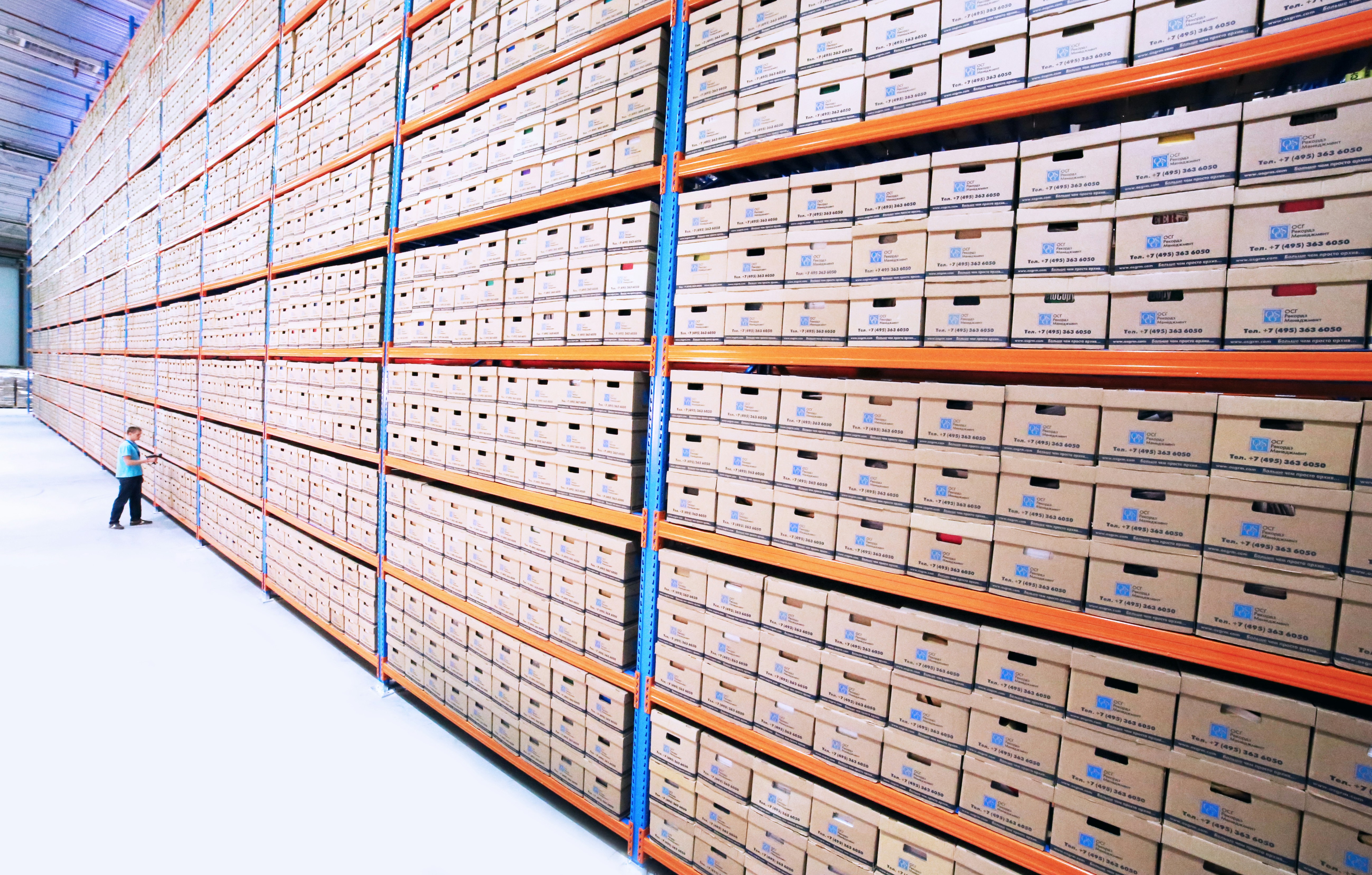 brown and orange warehousing shelves. Author: Nana Smirnova