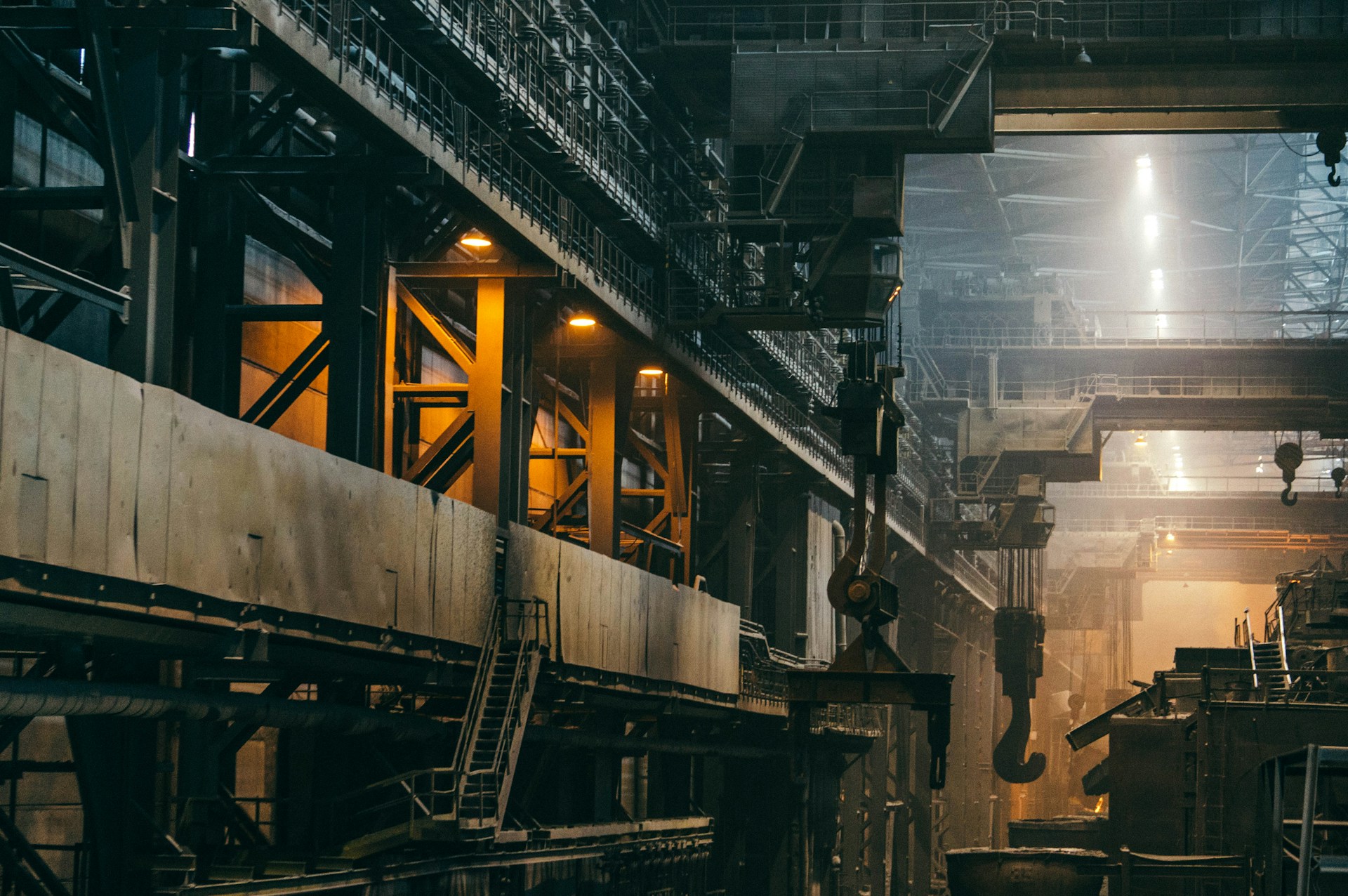 The photo presents the interior of a large industrial factory.