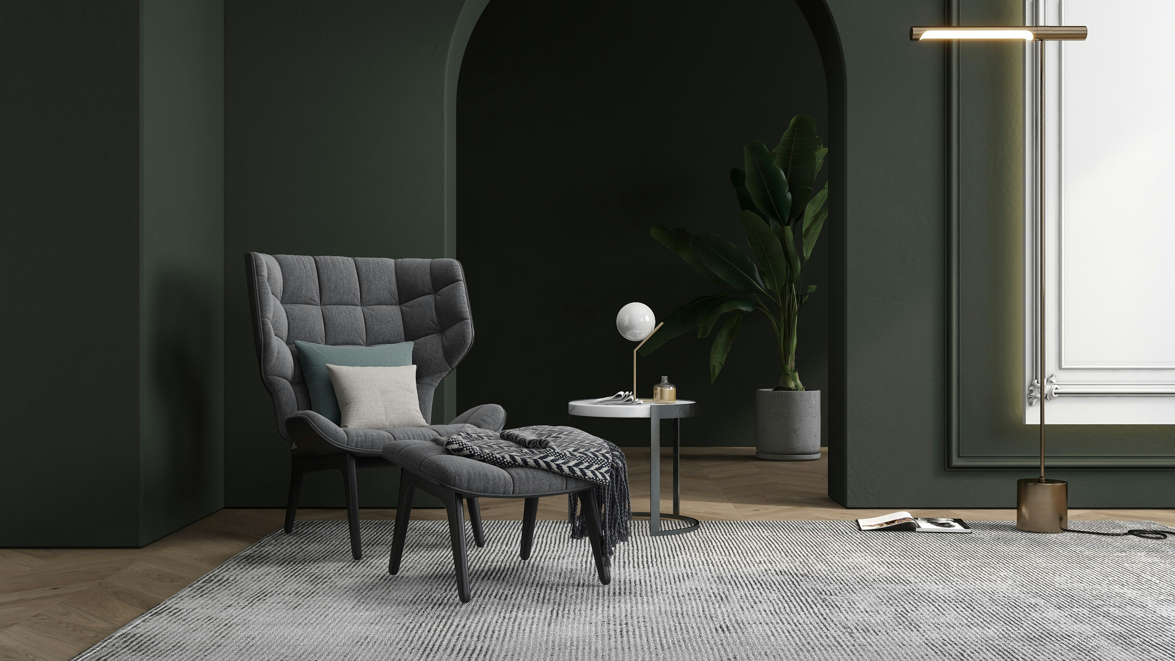 Modern interior featuring an upholstered armchair, cushions, a textile throw and a large woven rug in a contemporary living space.