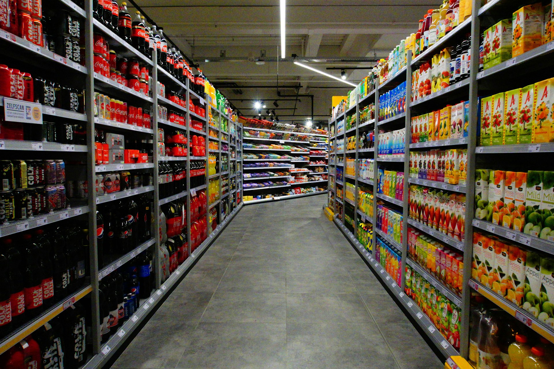 The photo presents shelves in a supermarket.