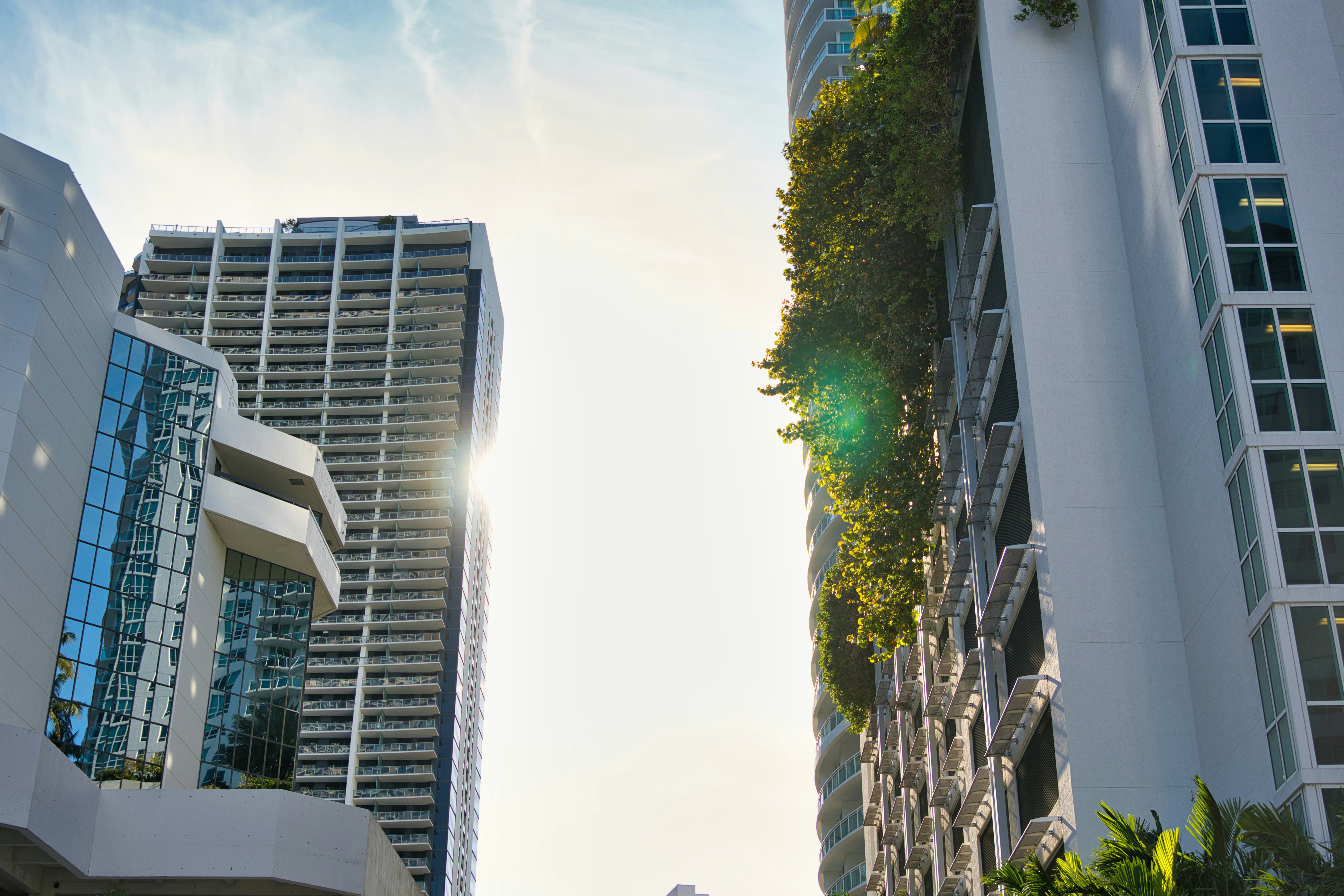 The picture showcases a modern urban buildings featuring integrated greenery and contemporary architecture.