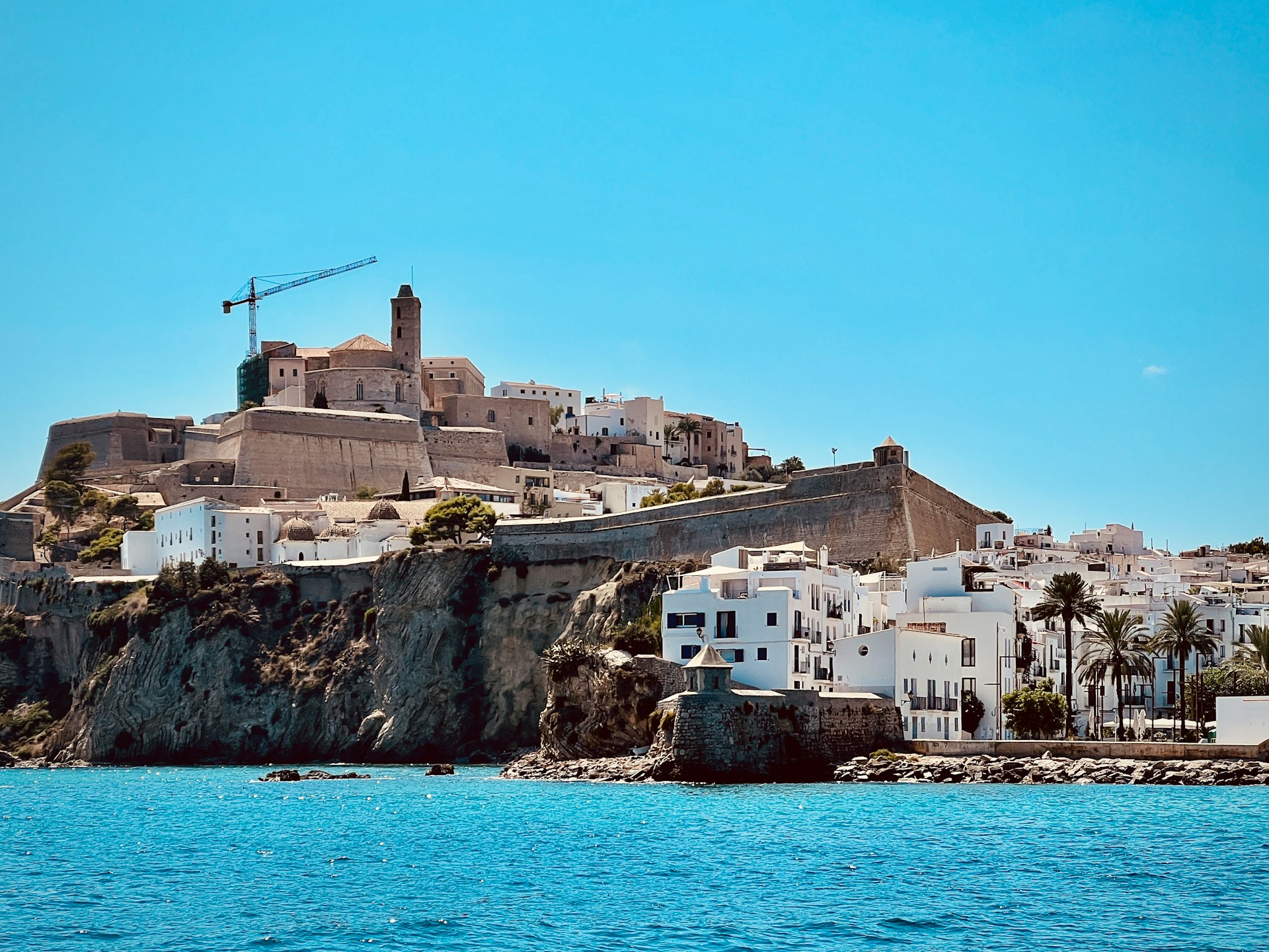 The photo shows the historic Dalt Vila in Ibiza, Spain.