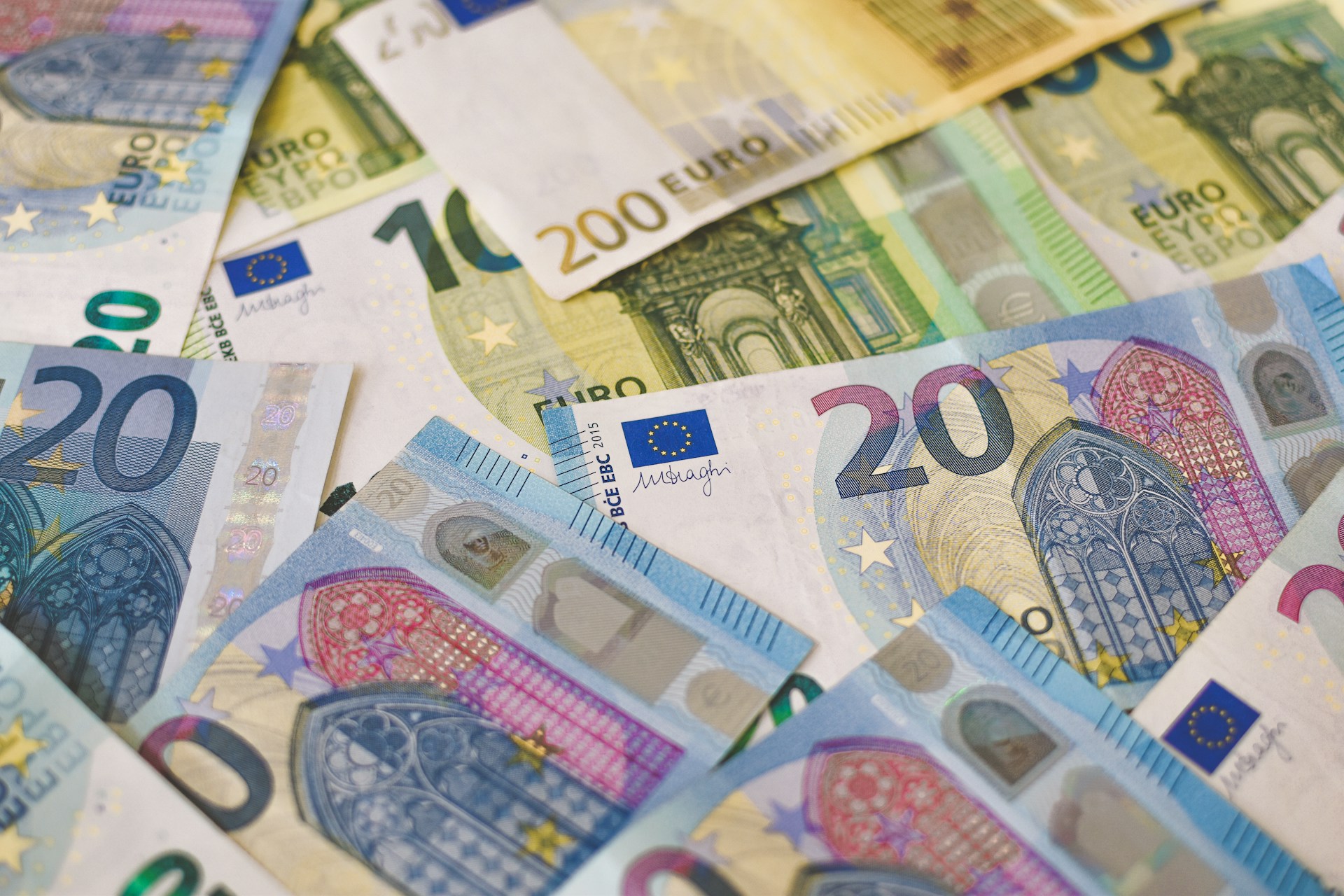 The photo presents different euro banknotes.