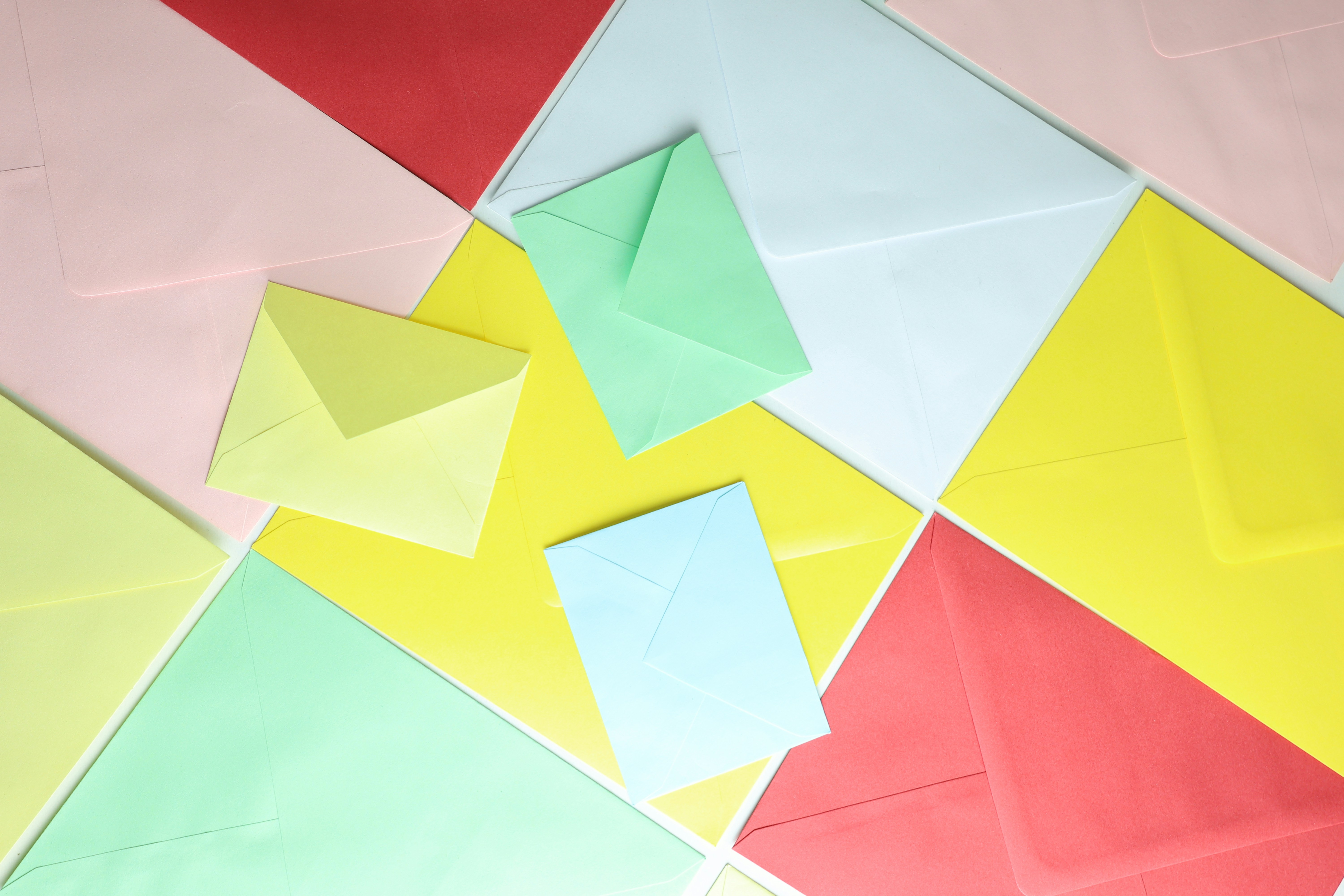 The picture shows colorful paper envelopes.