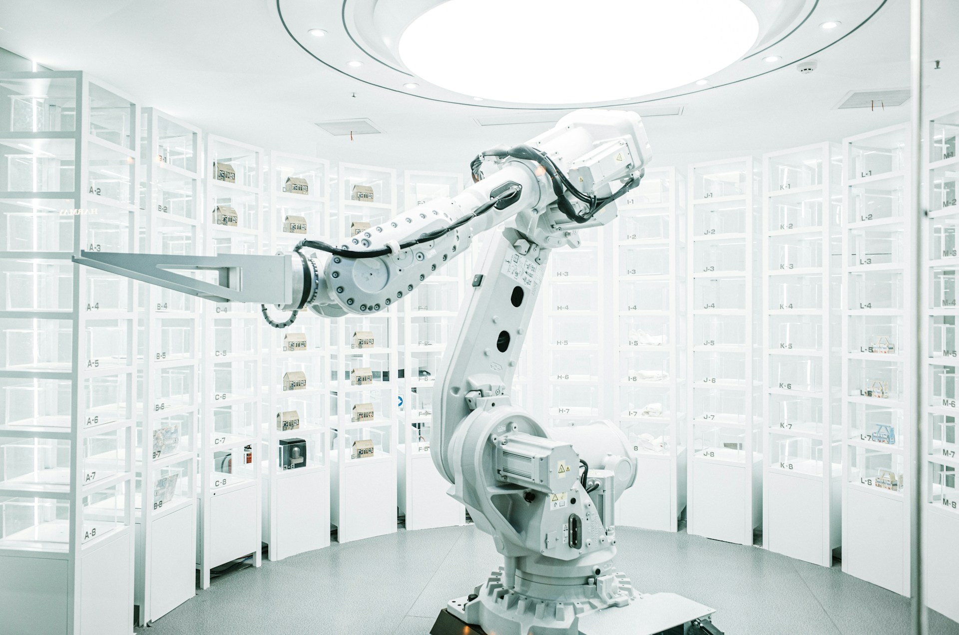 The photo presents an industrial robot in a modern laboratory.