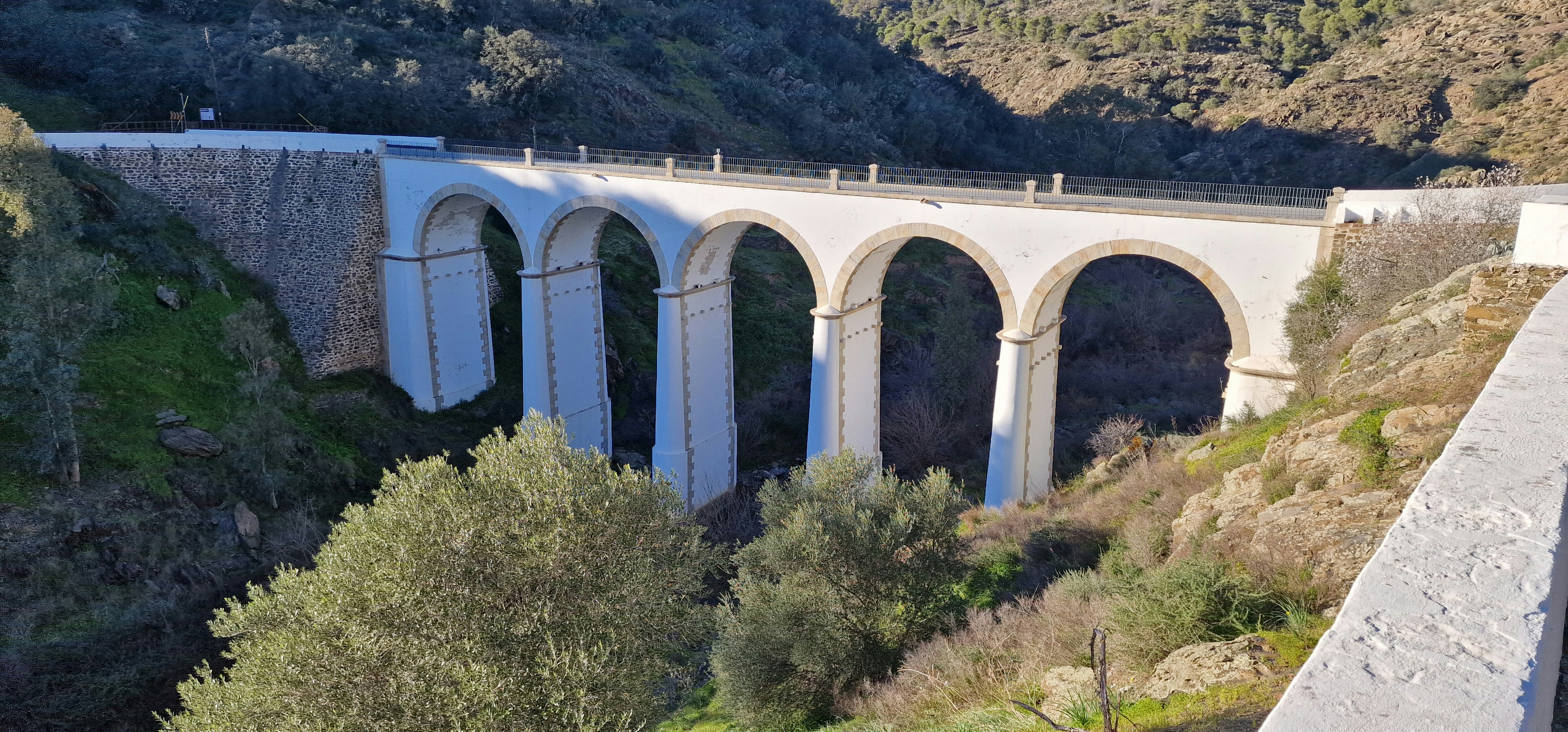 Photo by Unsplash An illustrative photo of a bridge built into the side of a mountain
