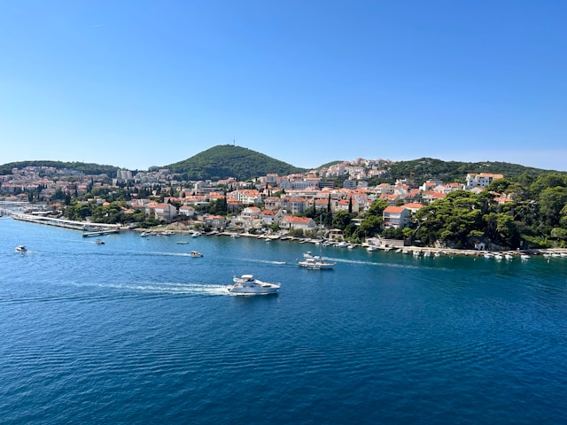 An illustrative photo of a boat near a city in Croatia