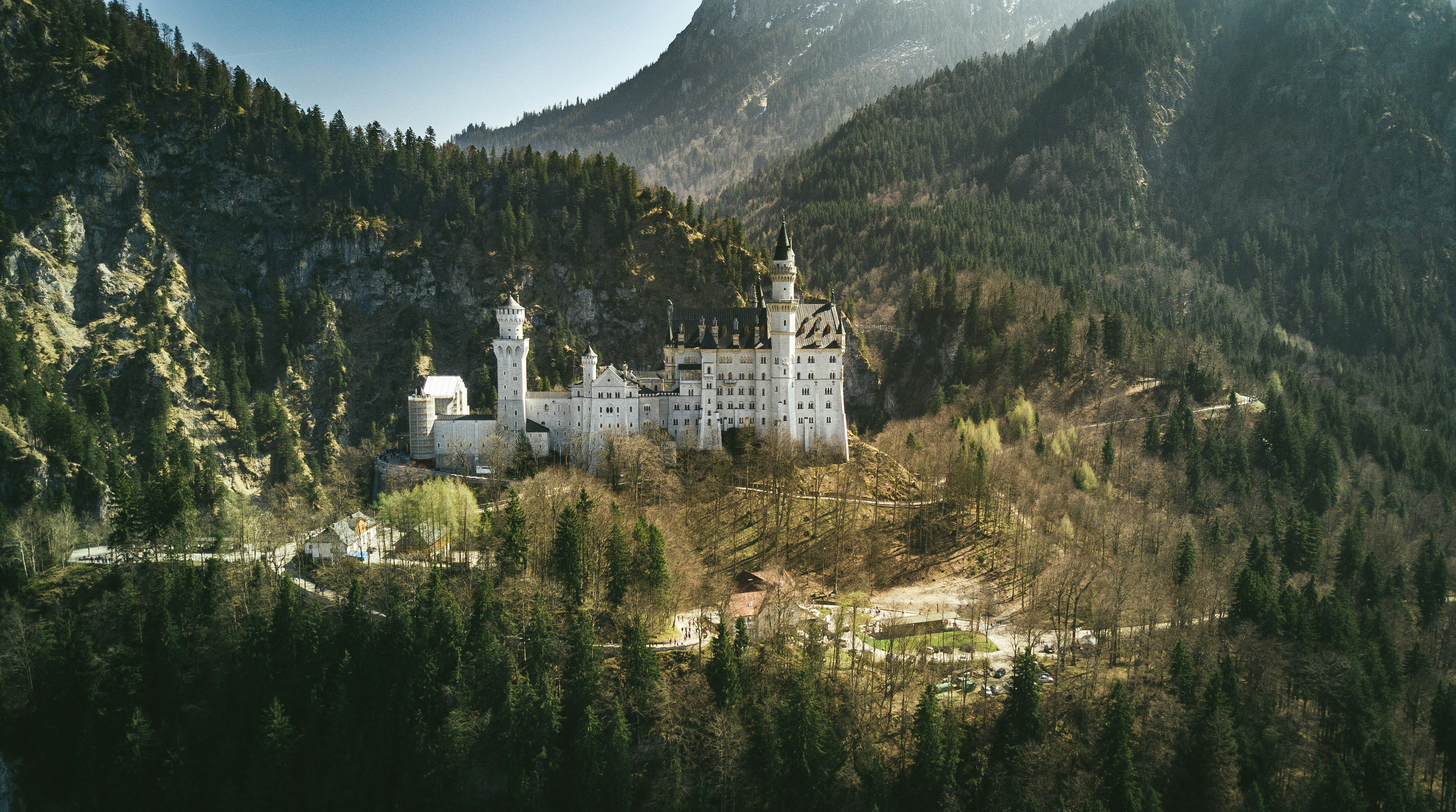 Photo by Unsplash An illustrative photo of castle near the mountain.