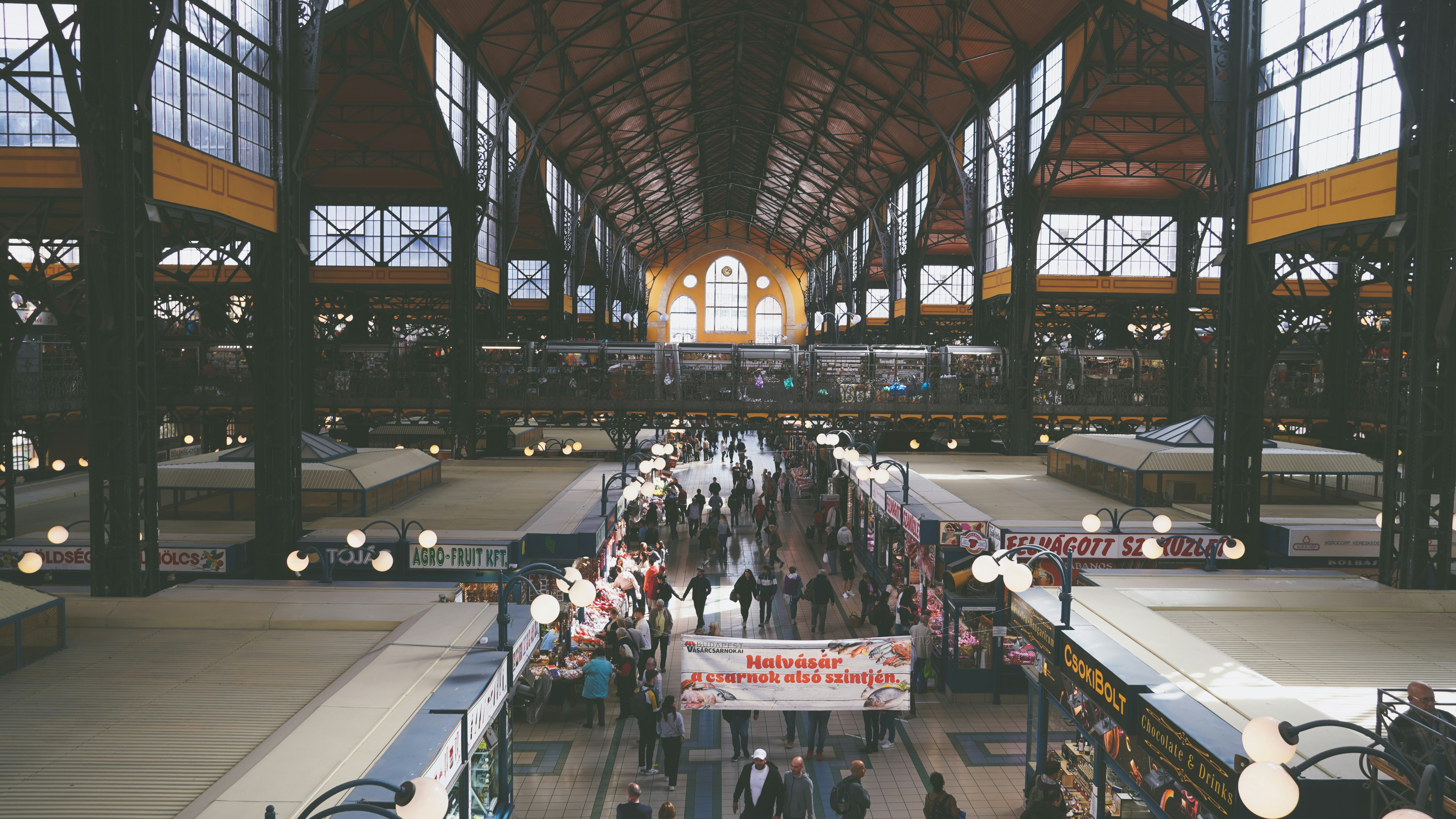 An illustrative photo of a large room with people in it.