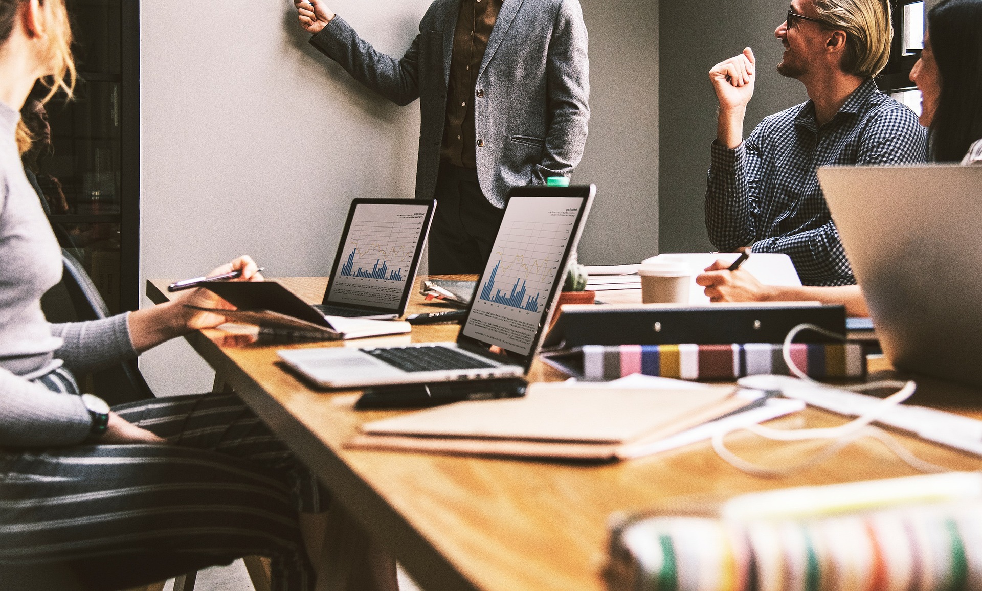 Photo by Pixabay An illustrative photo of a team in an office with laptops