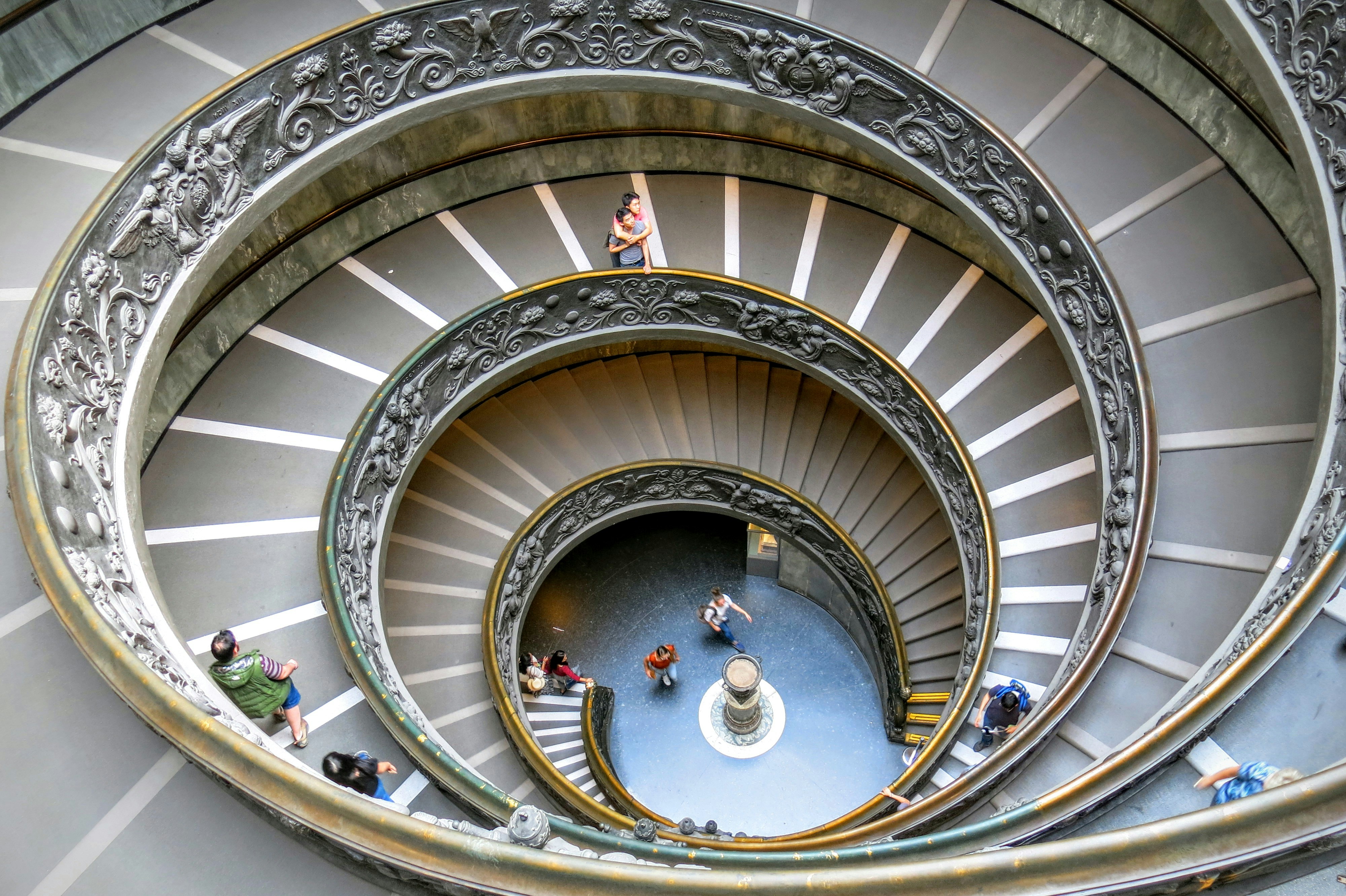 An illustrative photo of a brown and gray spiral ladder