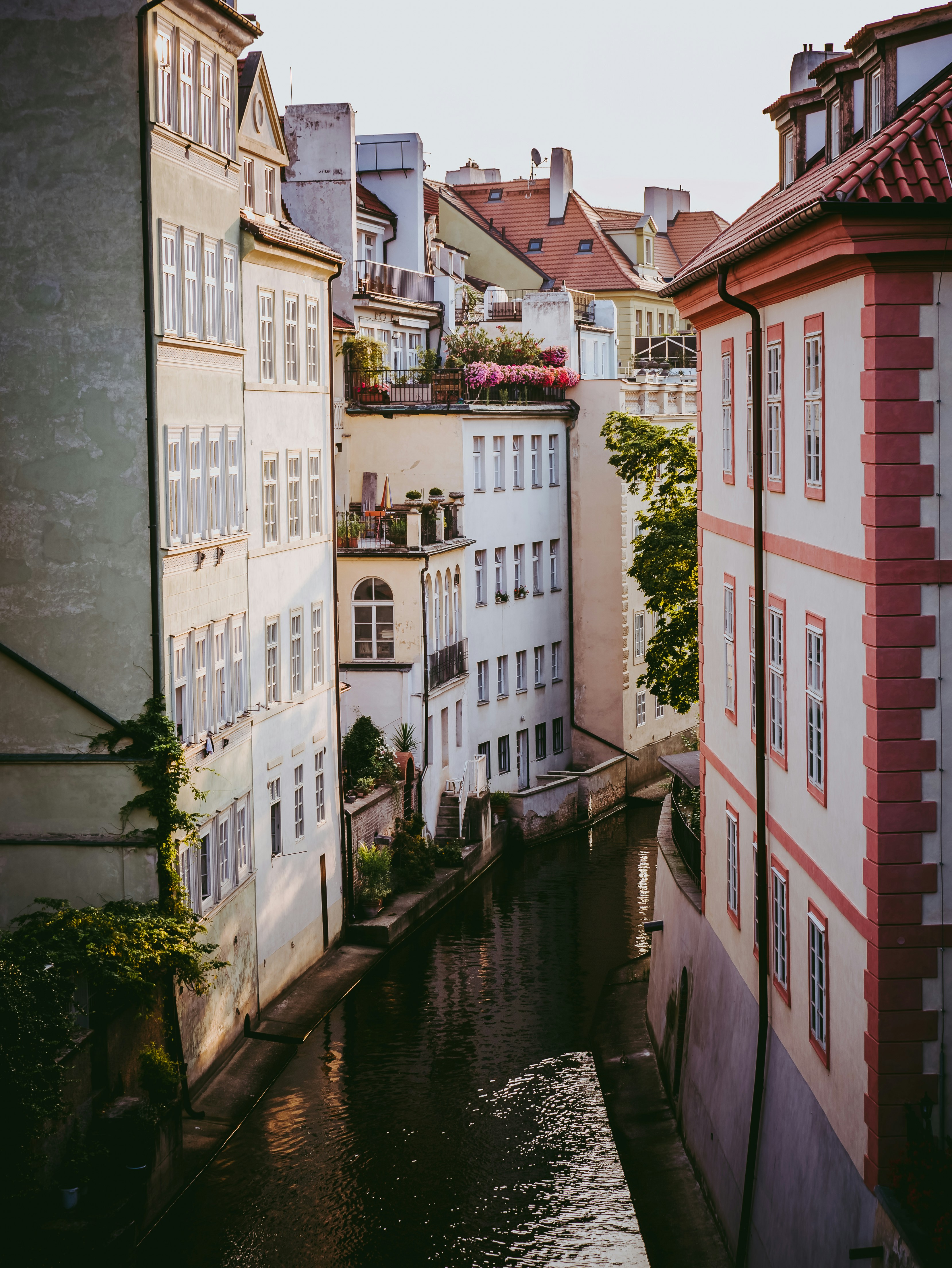 Photo by Unsplash An illustrative photo of a cityscape with a narrow water canal