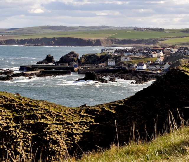 Photo by Unsplash An illustrative photo of a view of a small town by the ocean.