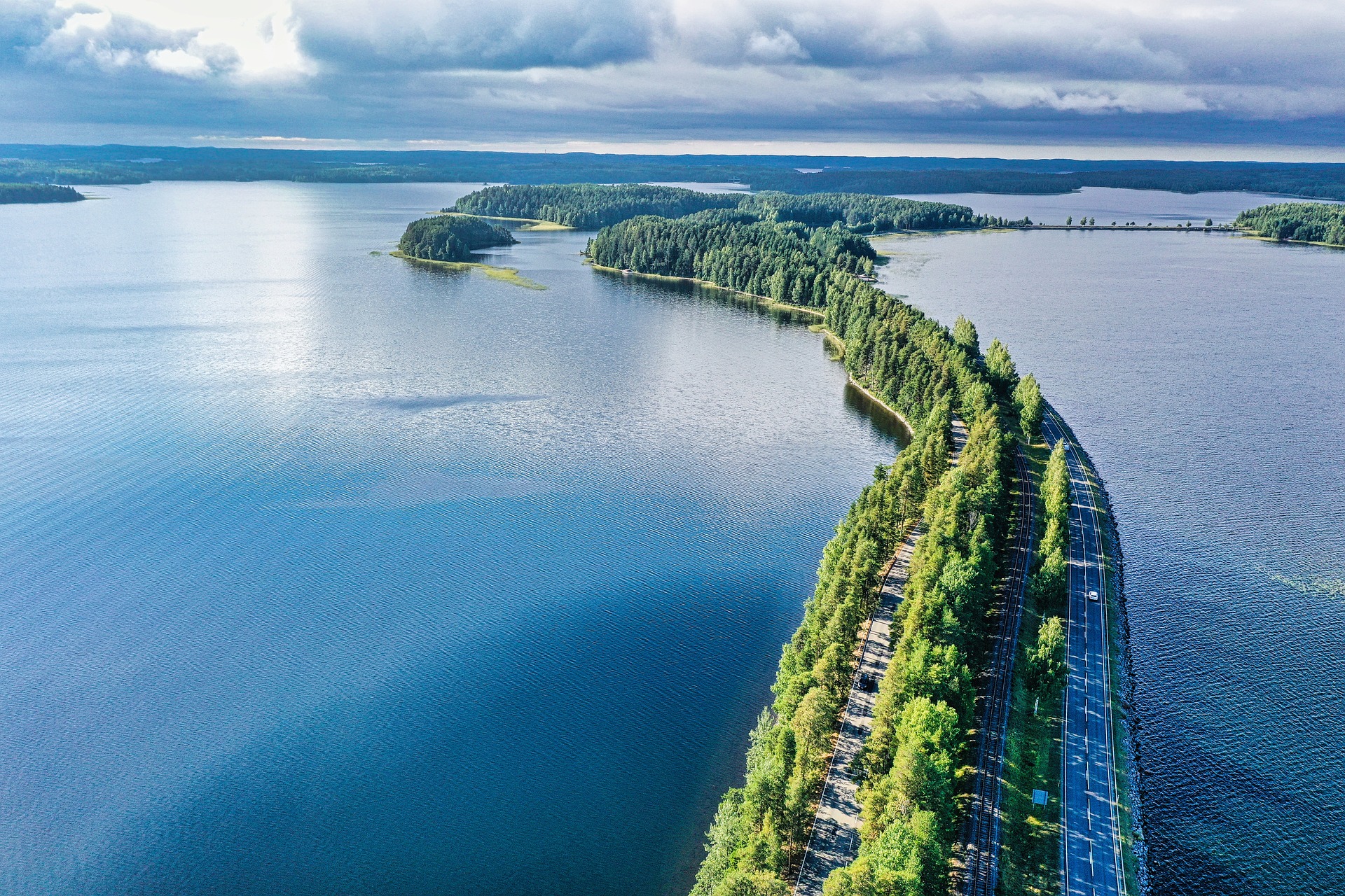 Photo by Pixabay An illustrative photo of a scenic lake with a road in Punkaharju, Finland