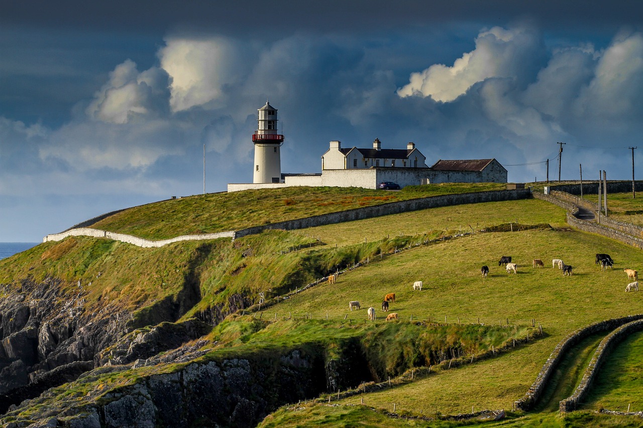 An illustrative photo of a coastal landscape featuring a lighthouse