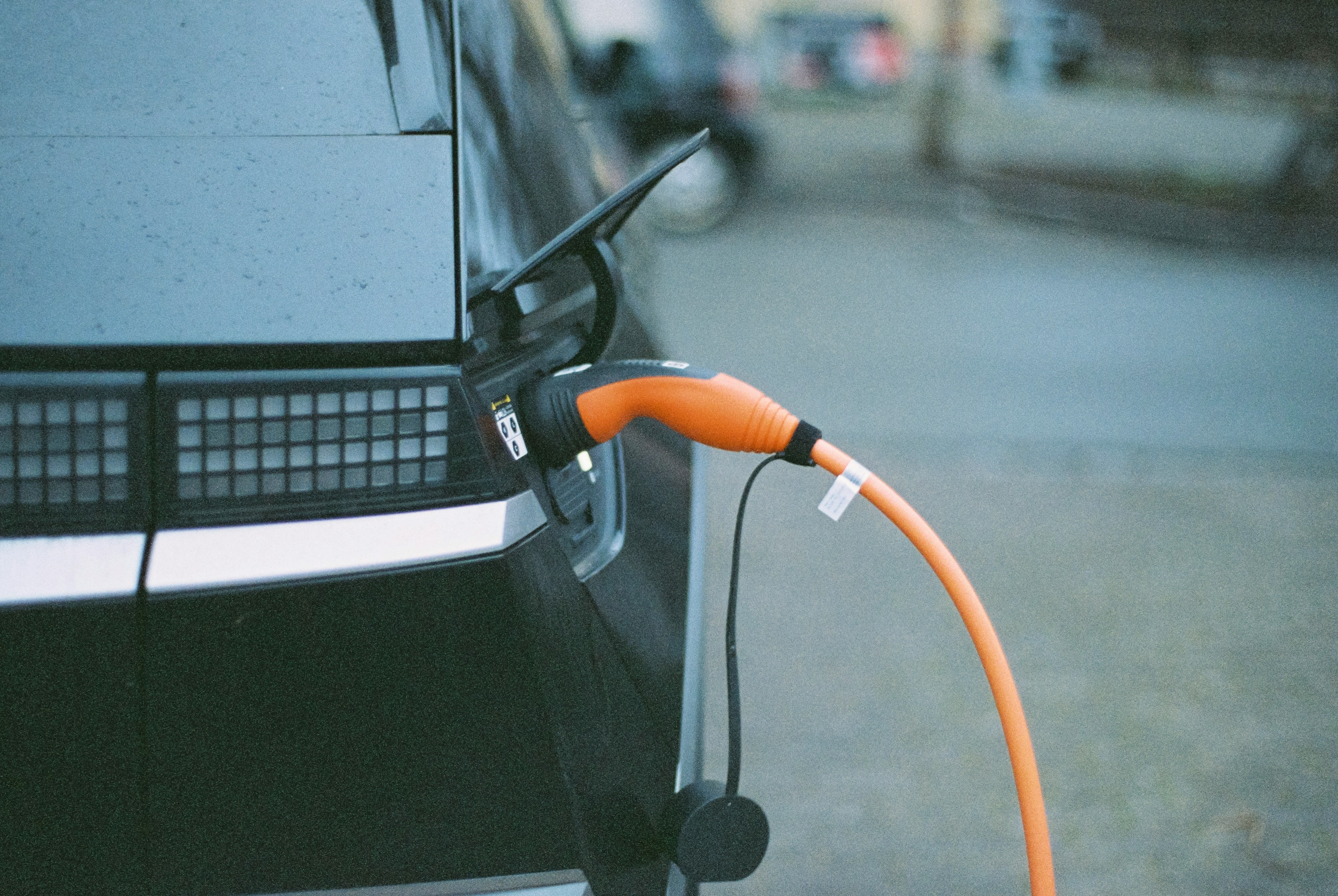 An illustrative photo of an electric car charging