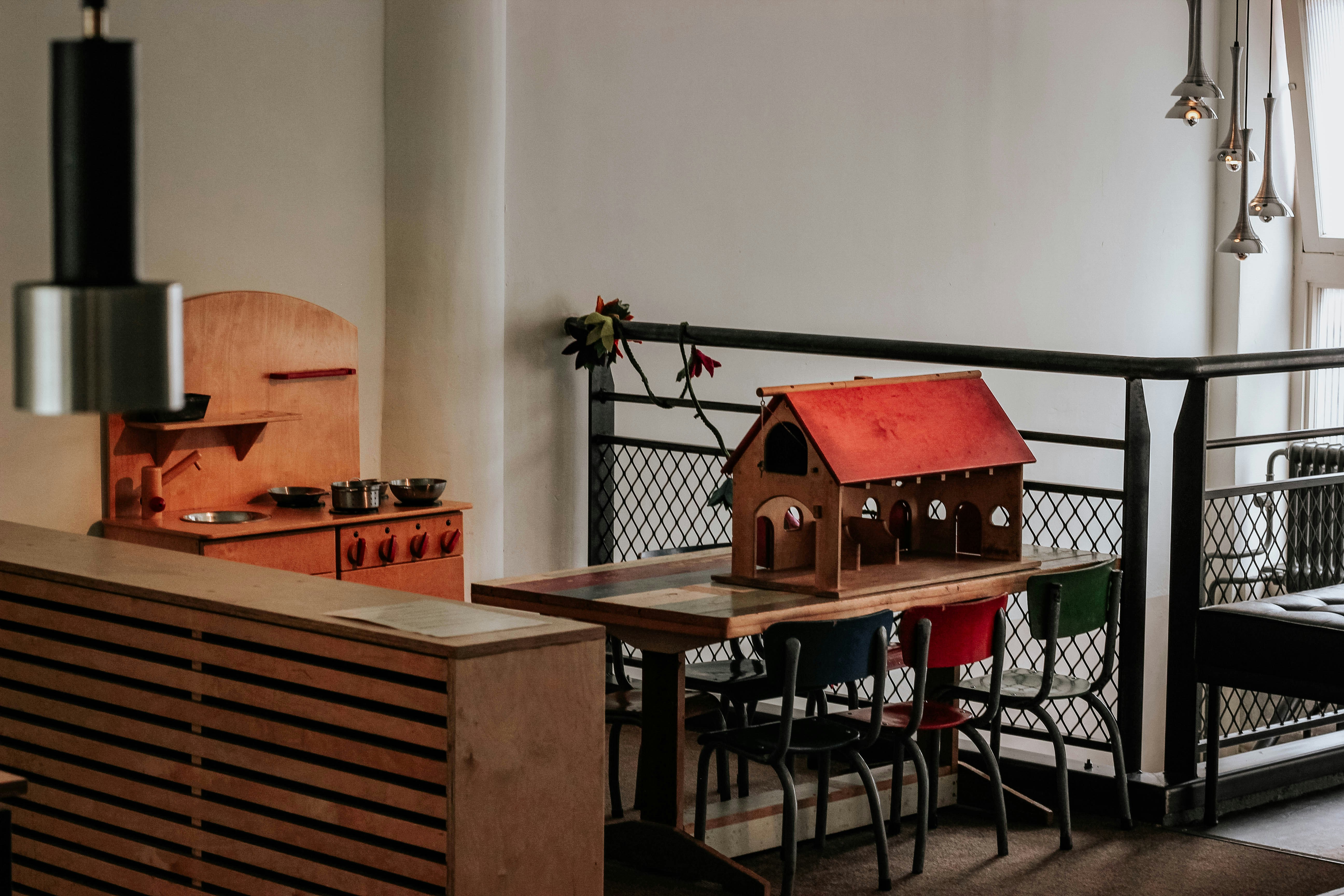 Photo by Unsplash An illustrative photo of red and brown house miniature