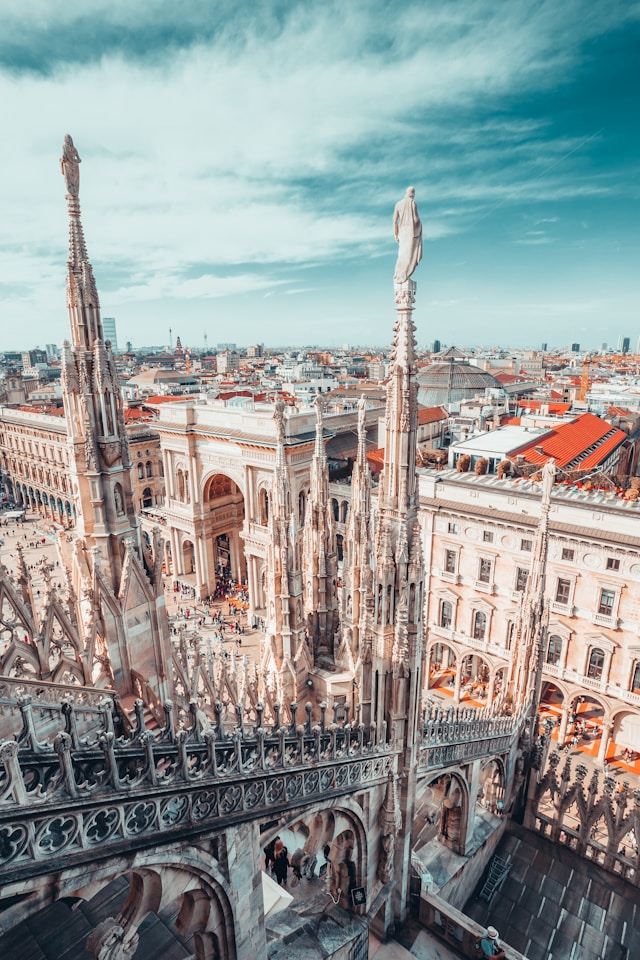 Photo by Unsplash An illustrative photo of people walking on a street near buildings during daytime