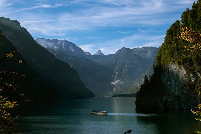 An illustrative photo of mountains and lake.