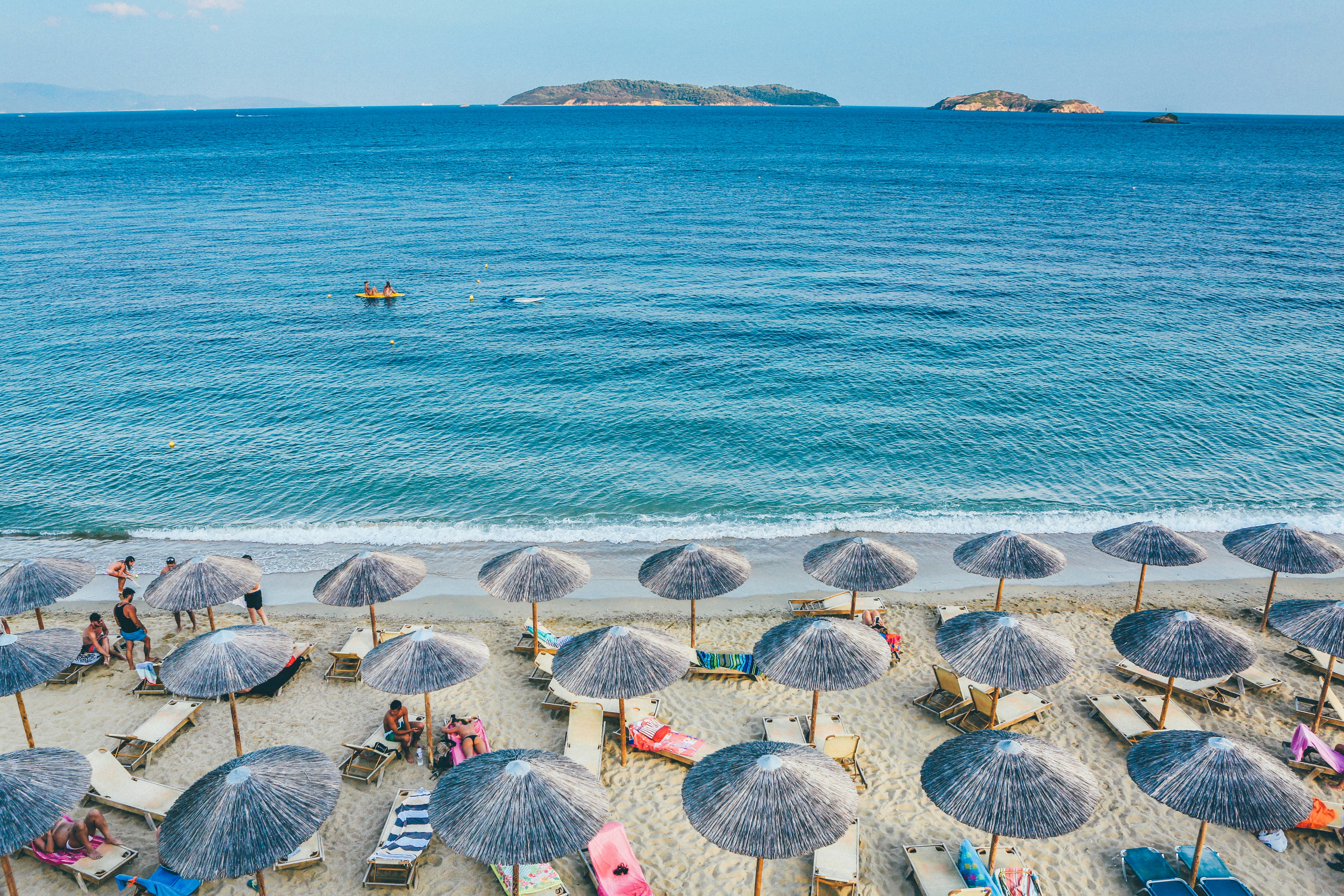 Photo by Unsplash An illustrative photo of a beach lounge on seashore.