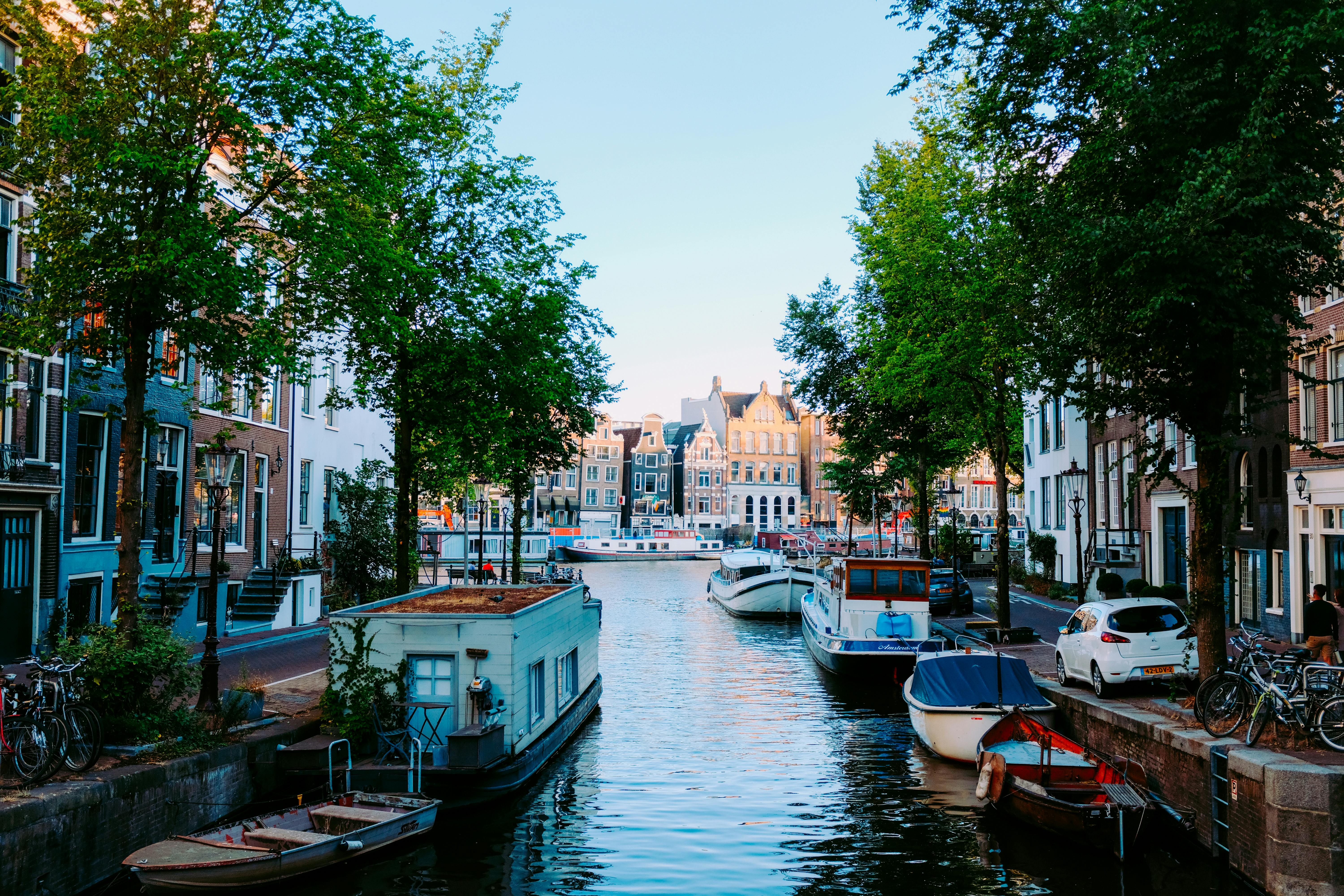 Photo by Pexels An illustrative photo of a scenery of old city situated on calm channel.