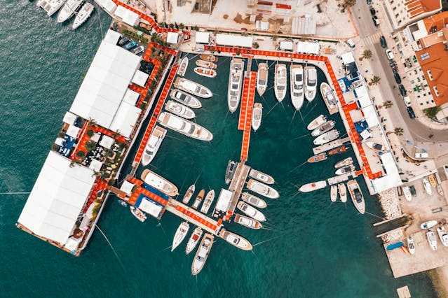 An illustrative photo of a marina with several boats in Croatia