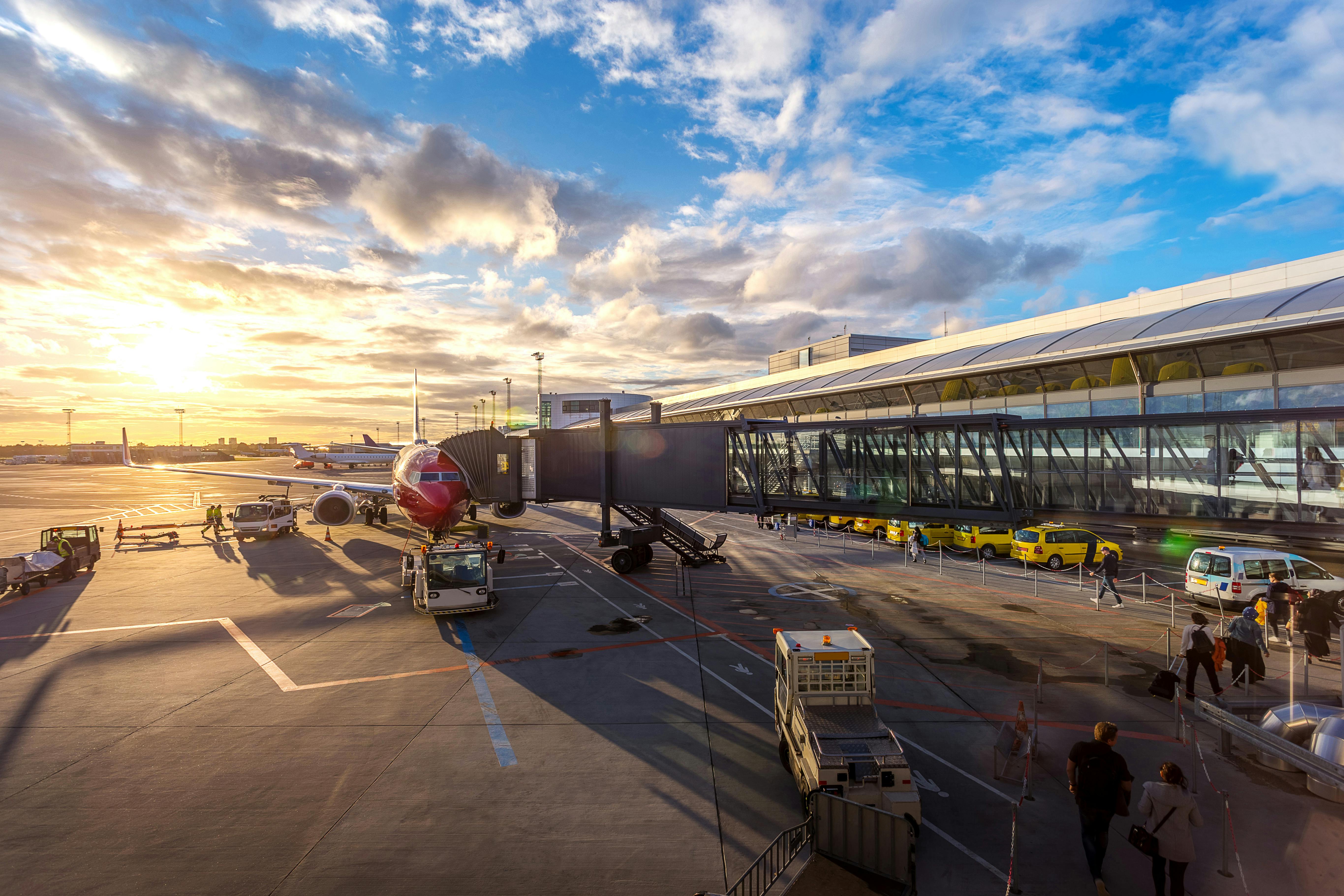 An illustrative photo of a red airplane.