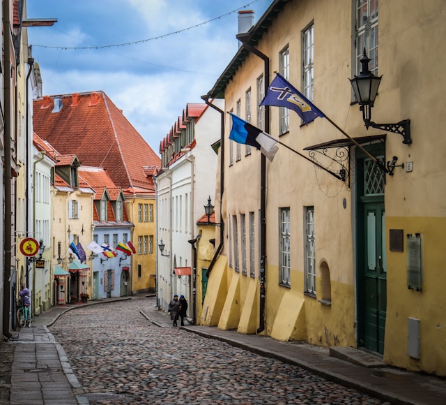 Photo by Unsplash An illustrative photo of cobblestone street in a historic Estonian town