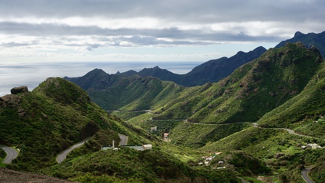 An illustrative photo of Tenerife’s rugged coastline with volcanic mountains in the background