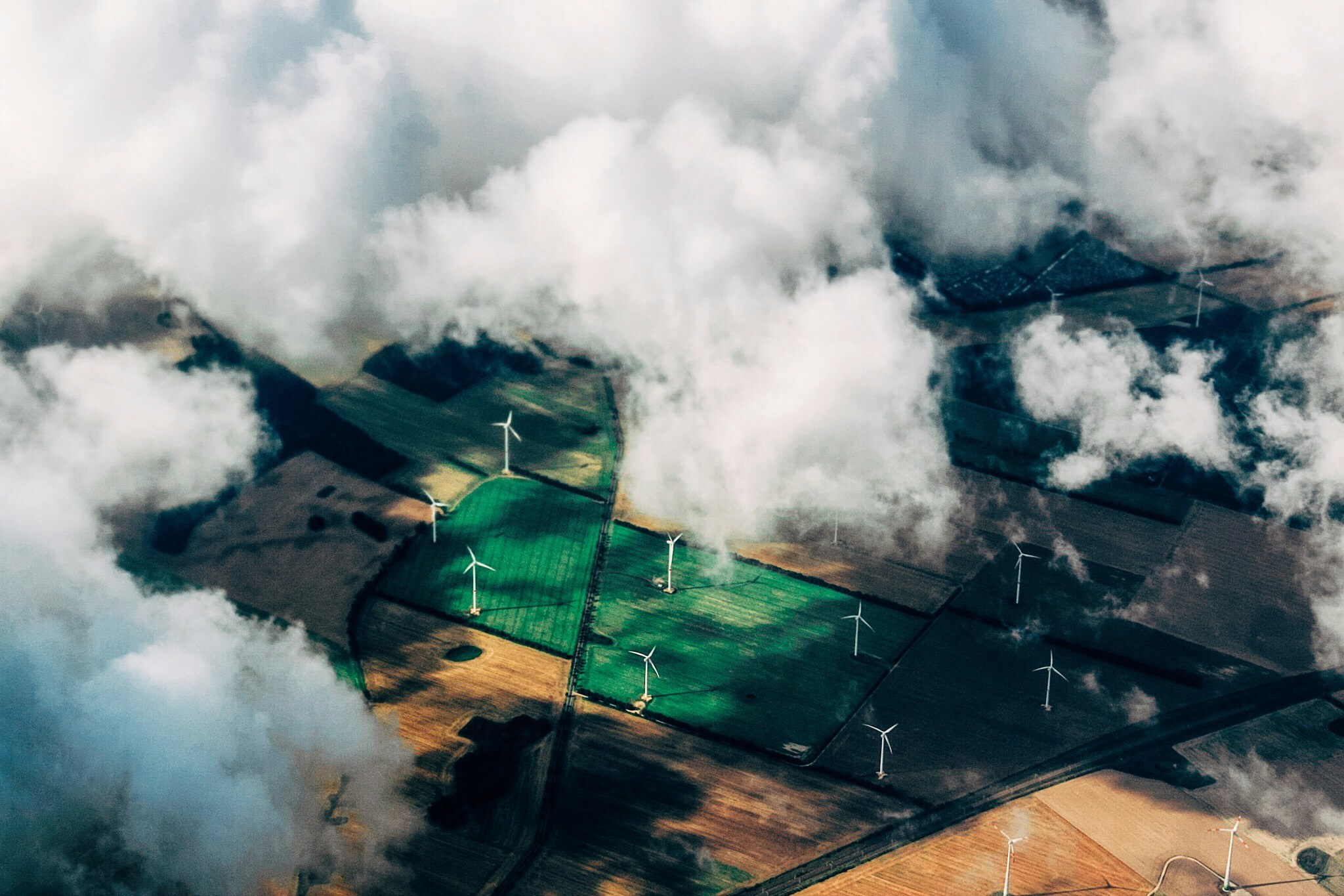 An illustrative photo of wind turbines near field