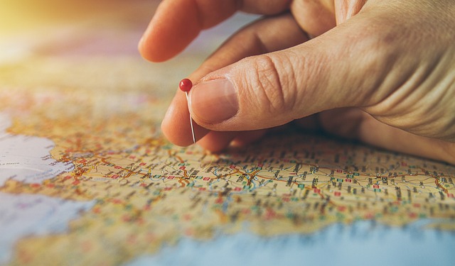 An illustrative photo of a hand with a map