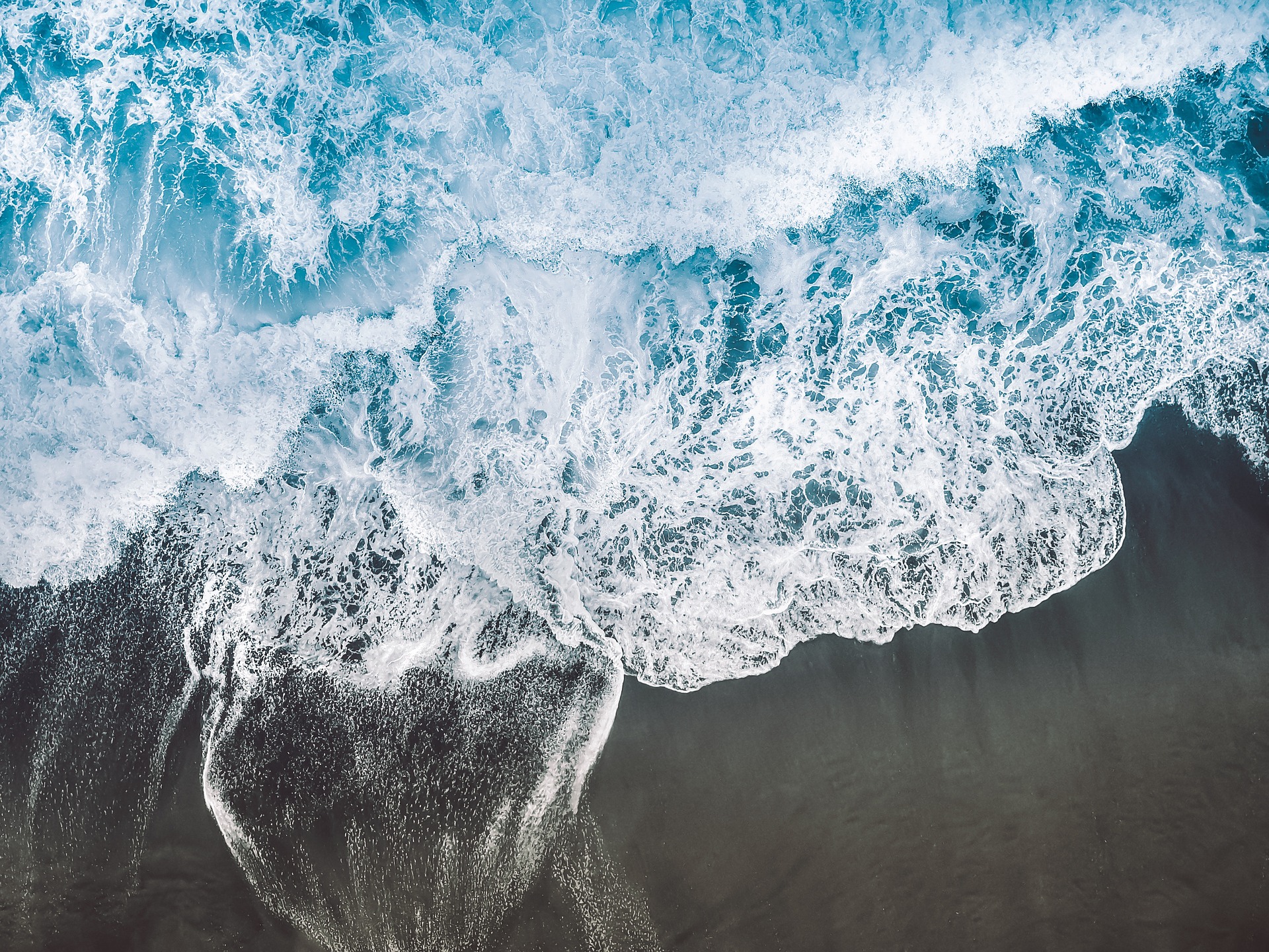 Photo by Pixabay An illustrative photo of ocean waves on the beach