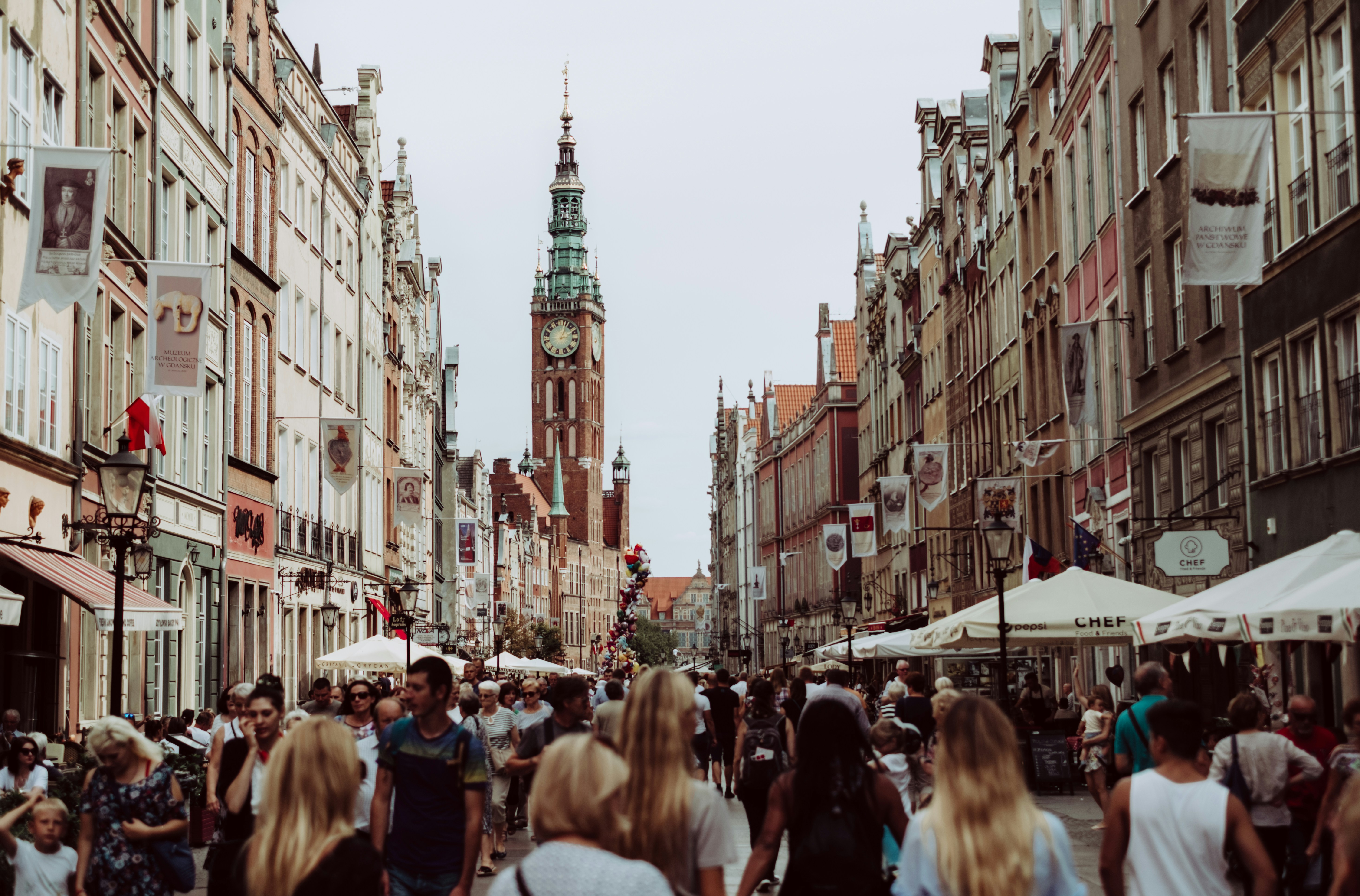 Photo by Unsplash An illustrative photo of a bustling street scene in a shopping district.