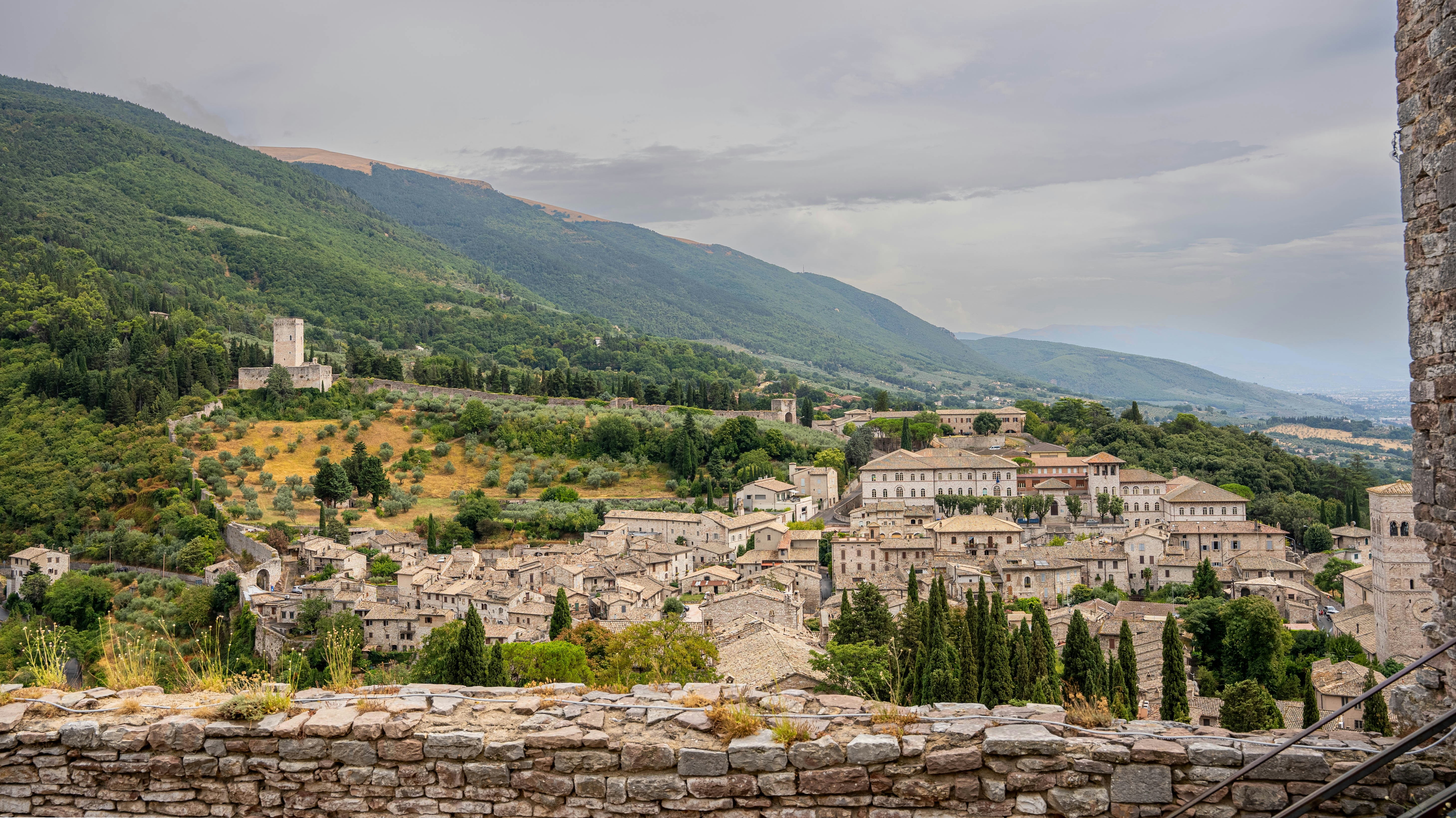 An illustrative photo of a village in the mountains.