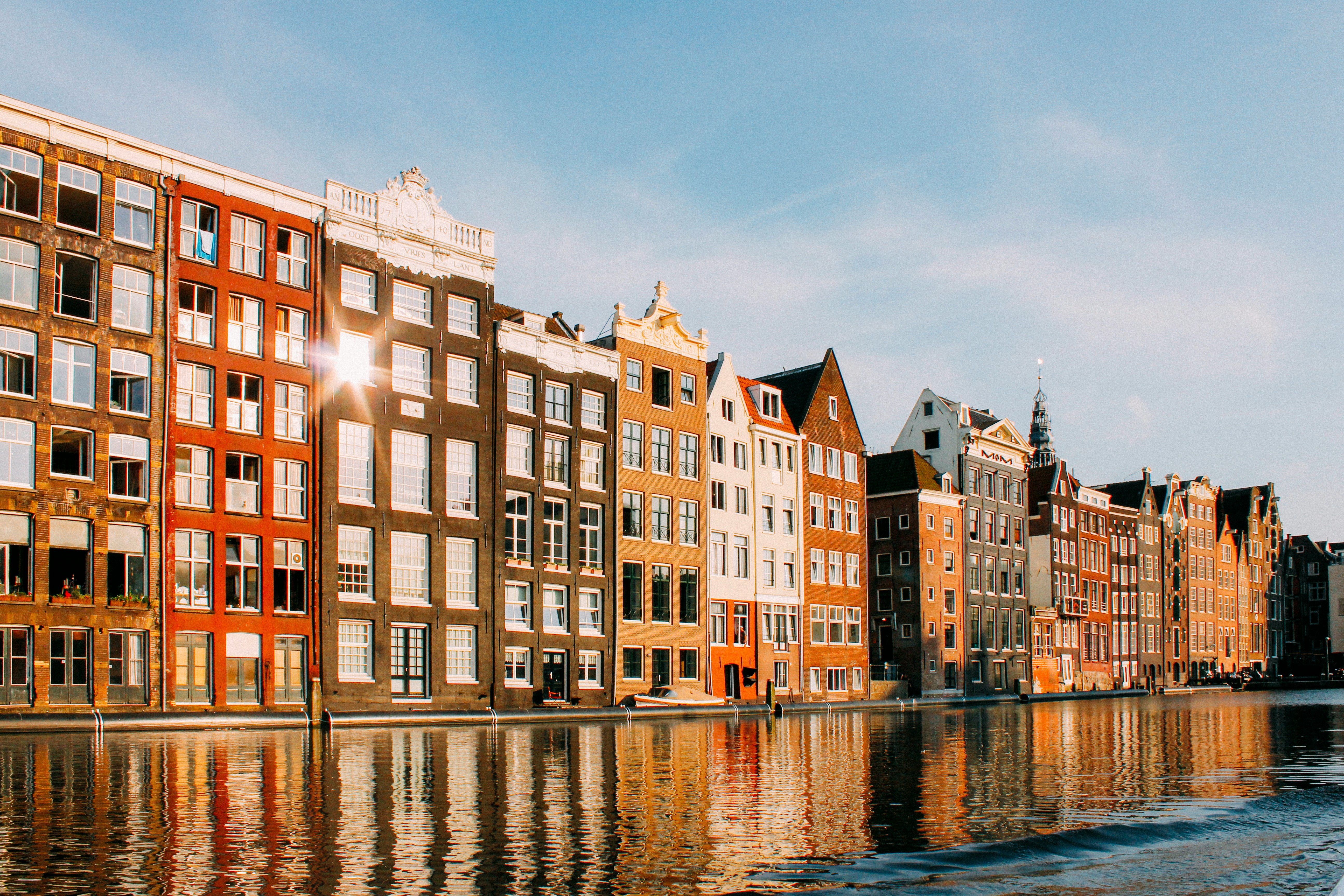 An illustrative photo of buildings near a body of water