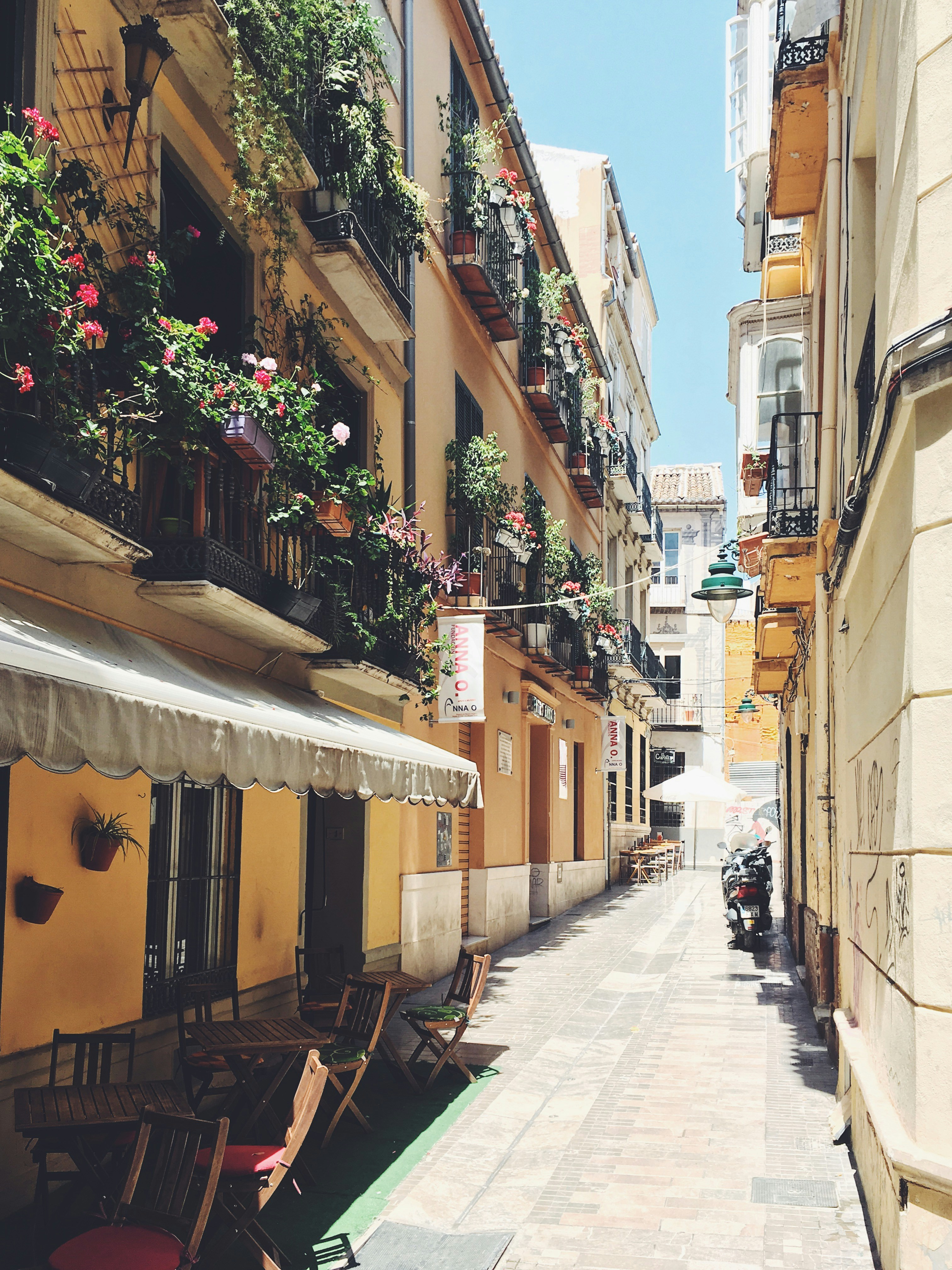 An illustrative photo of a narrow street in Spain