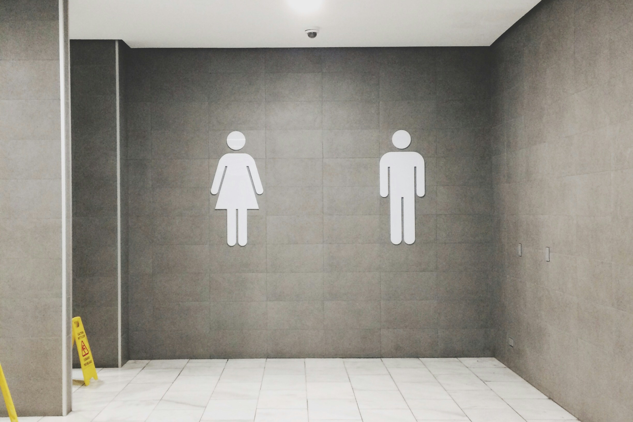 An illustrative photo of men's and women's bathroom signs