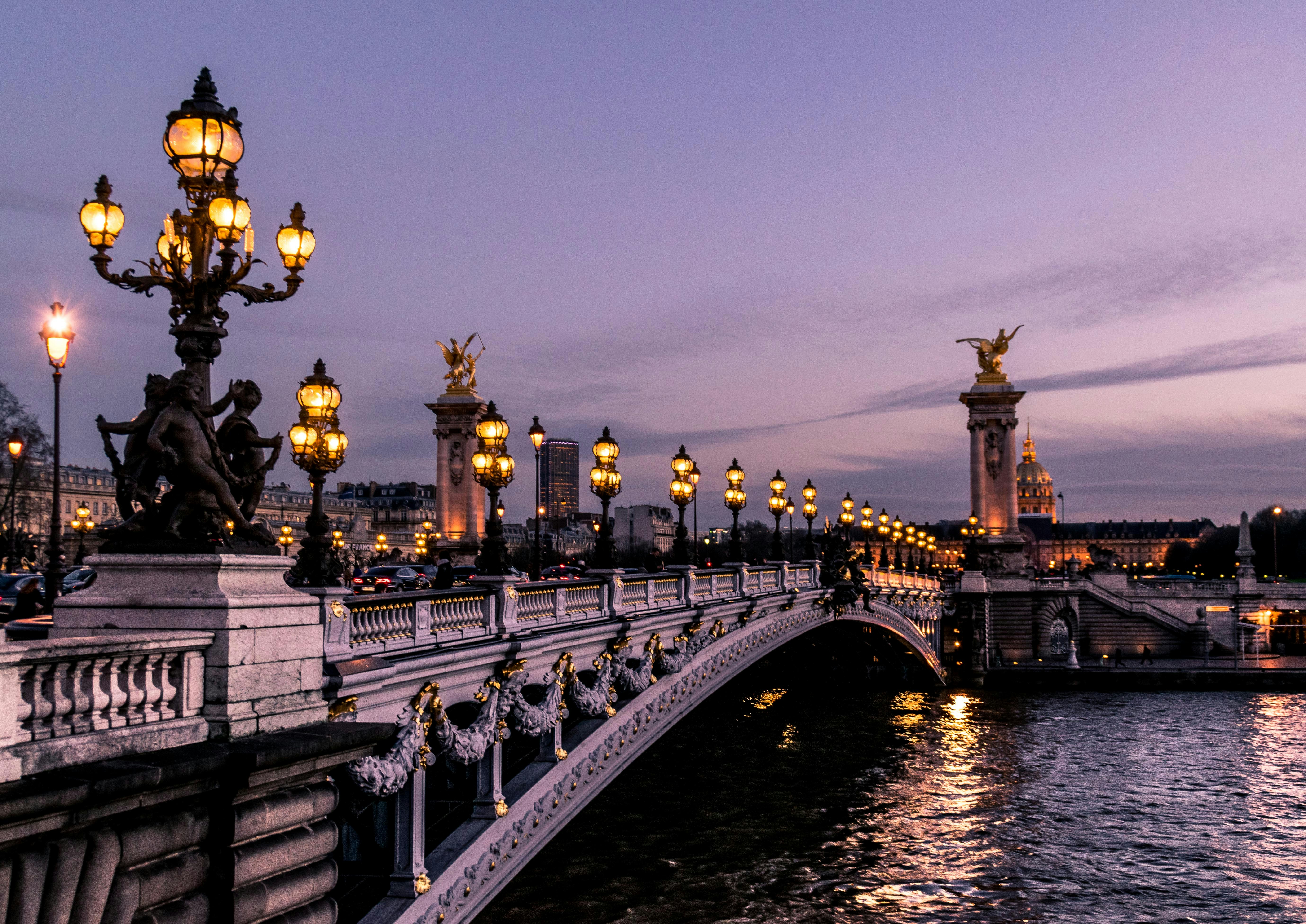 Photo by Unsplash An illustrative photo of a bridge in Paris during night time