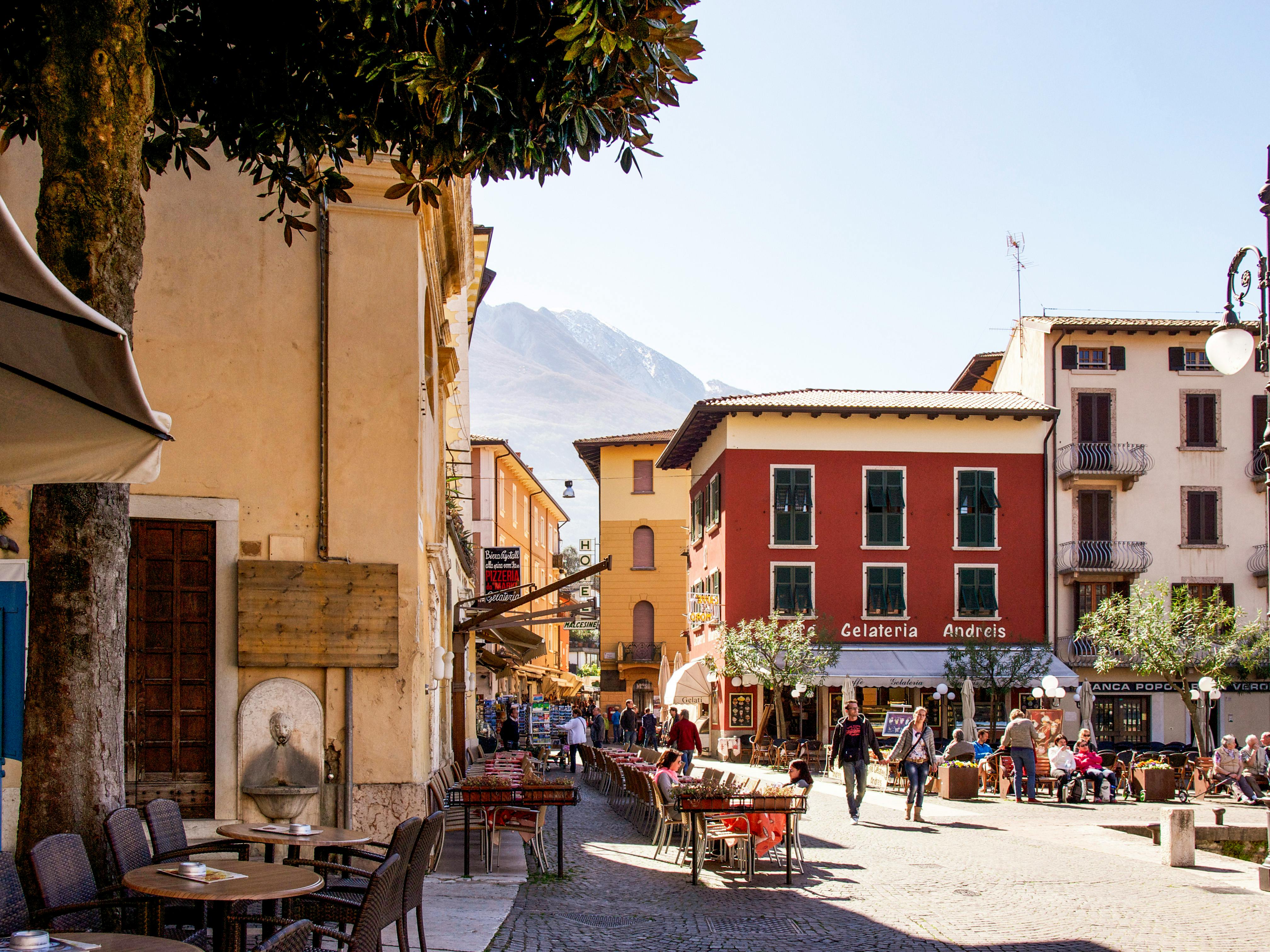 An illustrative photo of a vibrant street scene in a European town.