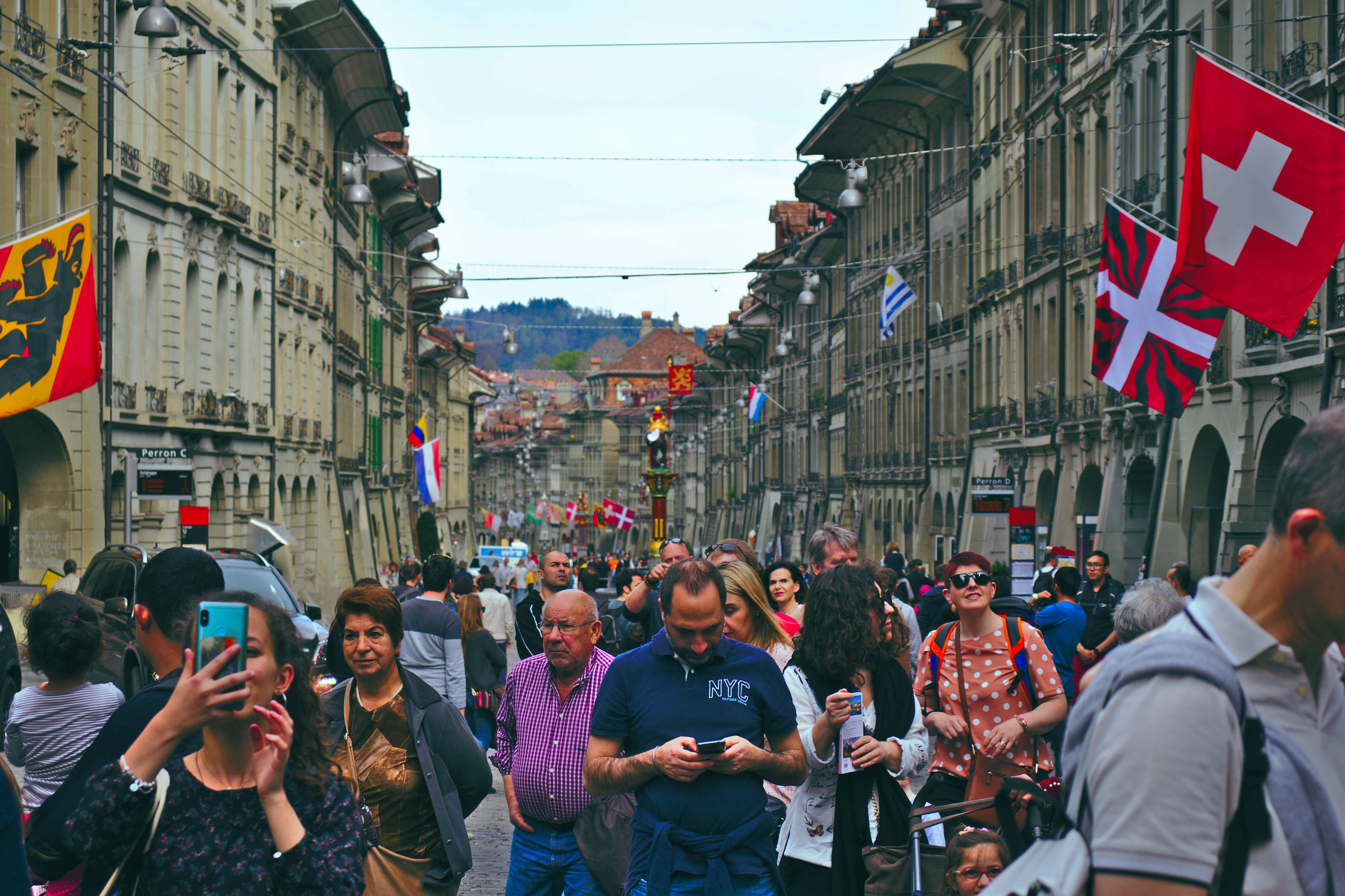 Photo by Unsplash An illustrative photo of people walking on a busy street