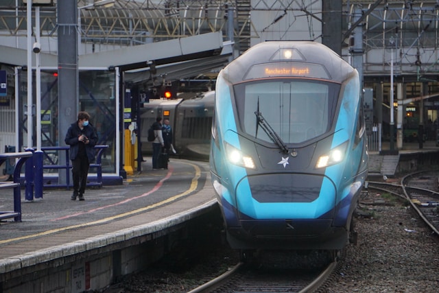 Photo by Unsplash An illustrative photo of a sleek blue and grey train