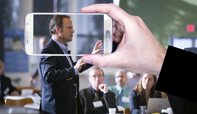 An illustrative photo of a video recording a conference