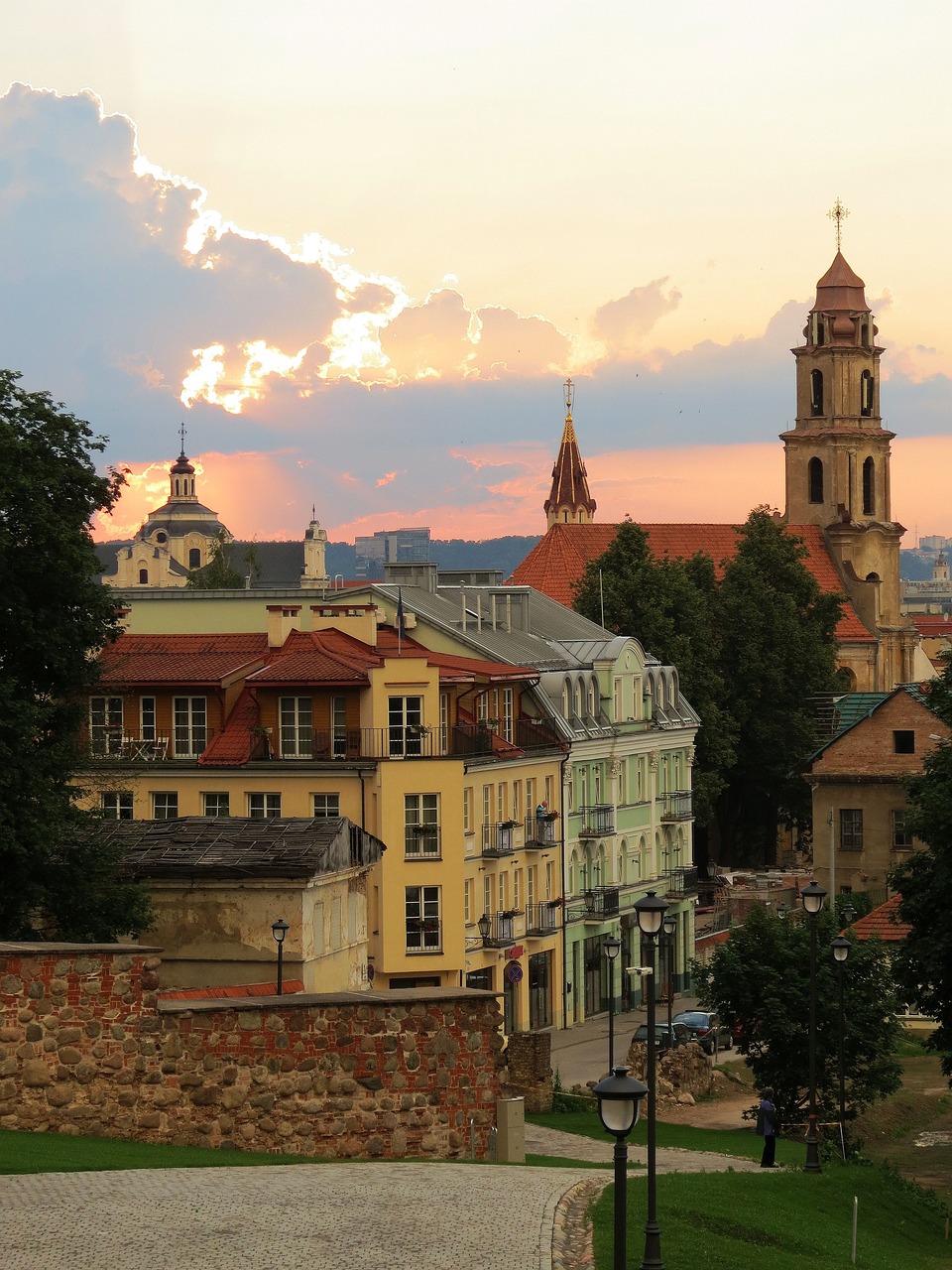 An illustrative photo of a view of buildings in Vilnius during sunset