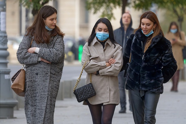 An illustrative photo of a group of women, all wearing face masks