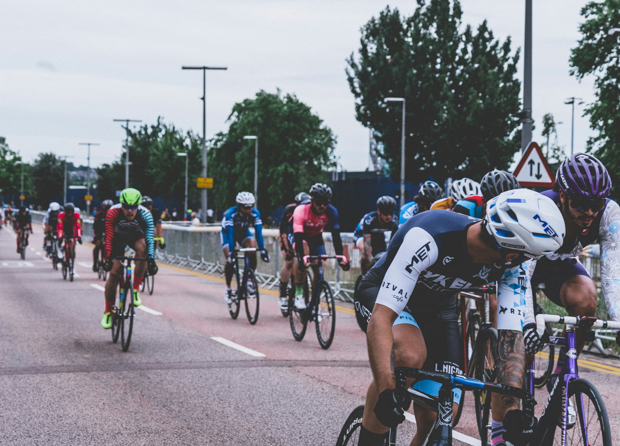 Photo by Unsplash An illustrative photo of group of men riding bicycles