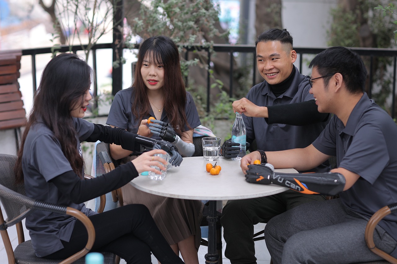 An illustrative photo of people with disabilities sitting at the table