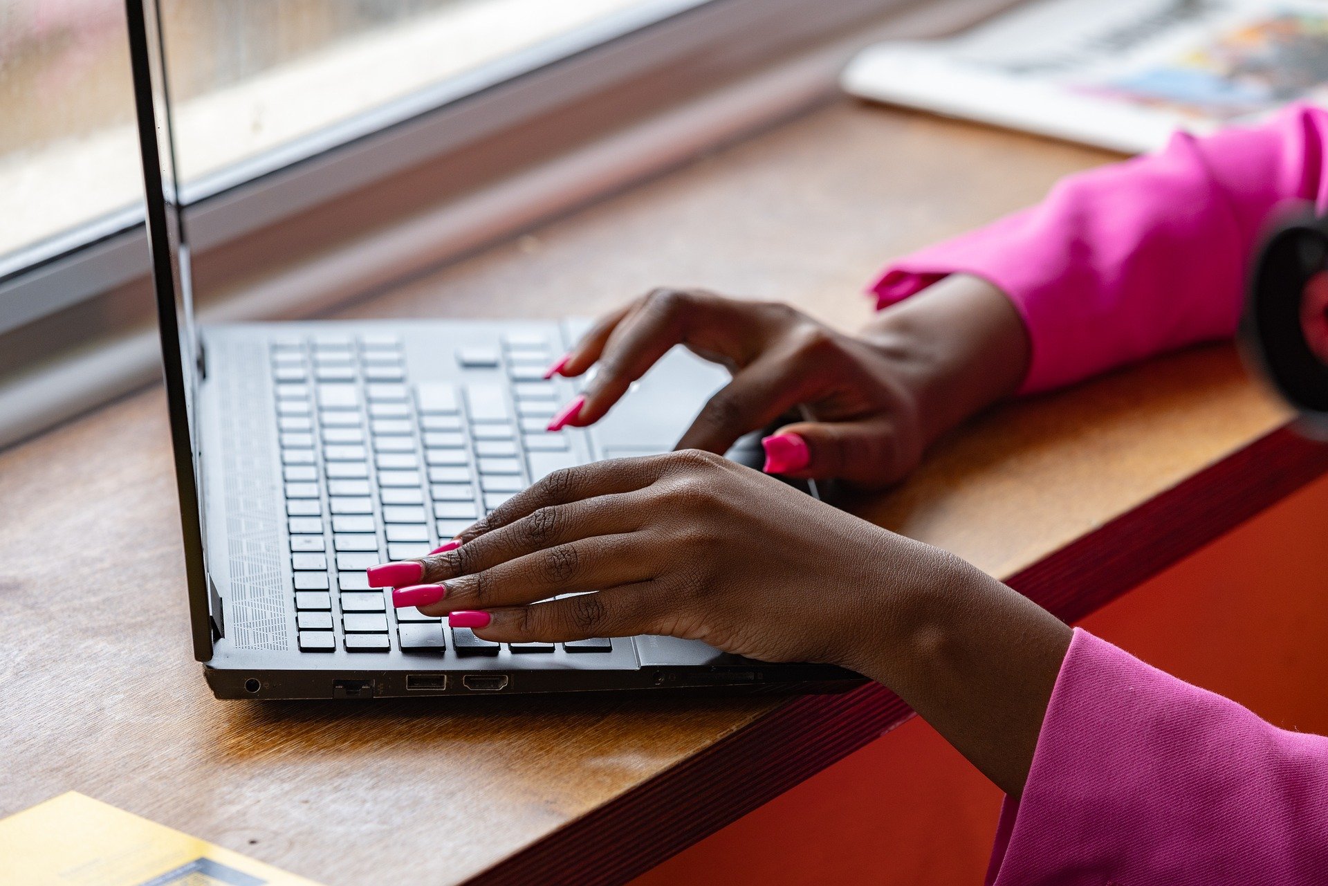 Photo by Unsplash An illustrative photo of a woman working